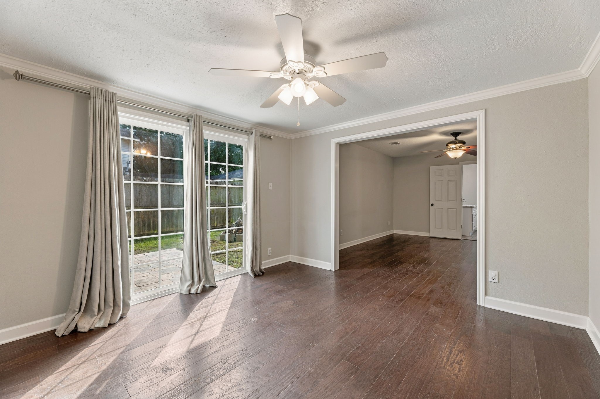 Extended study/flex room adjoining the primary suite with patio access!
