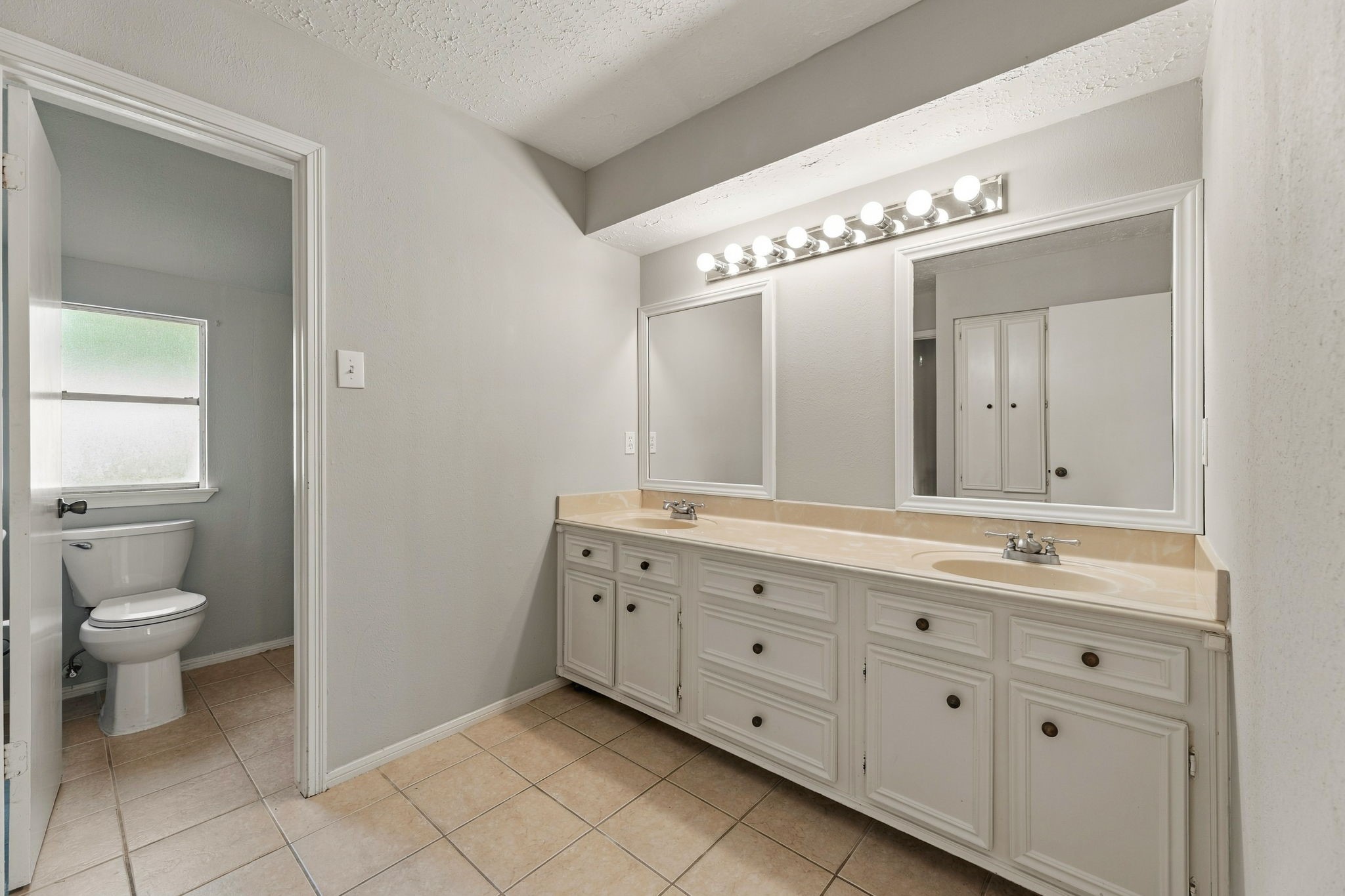 Spacious double vanity provides plenty of counter and storage space!