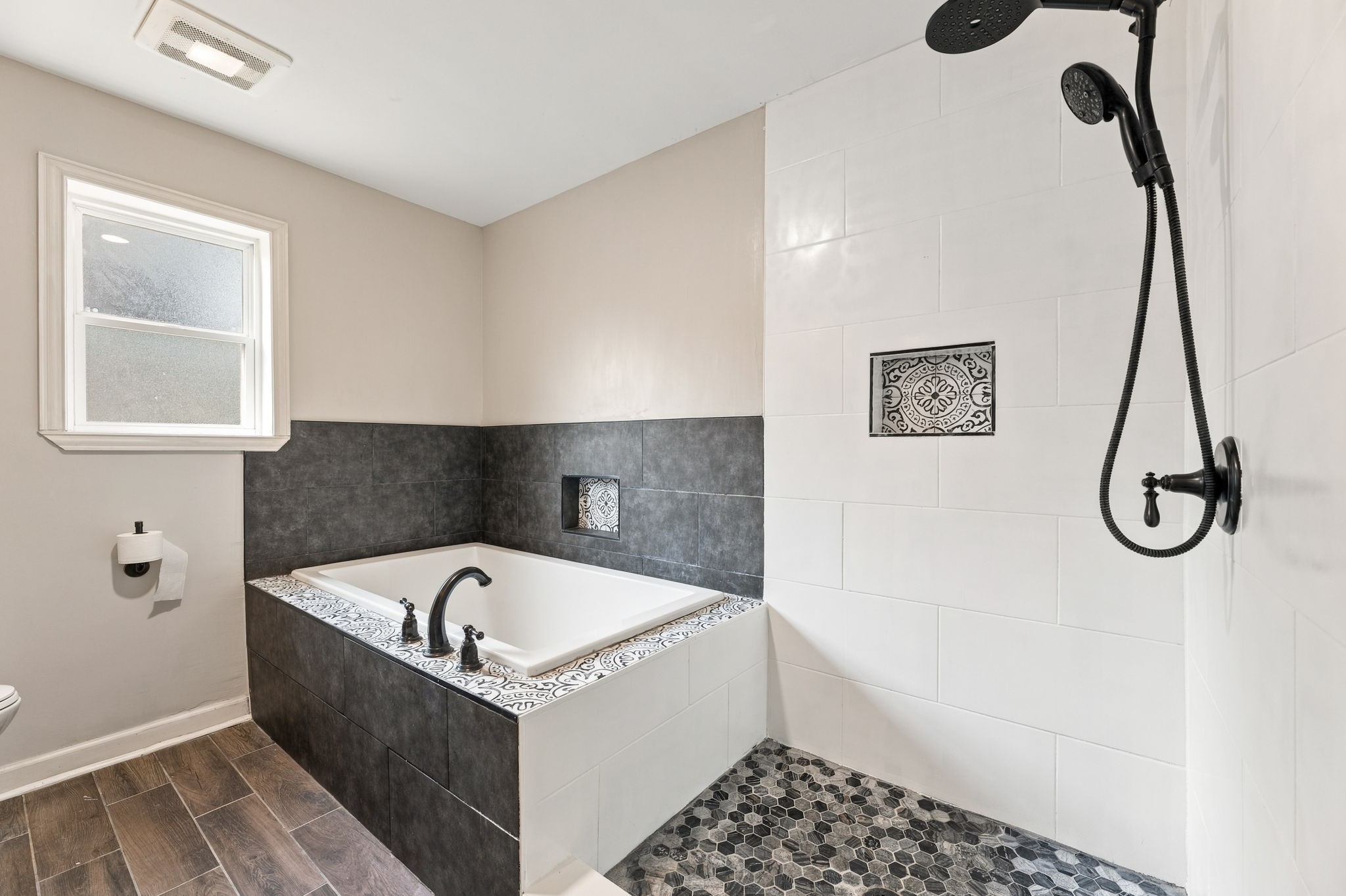 Relax and unwind in the oversized primary soaking tub!