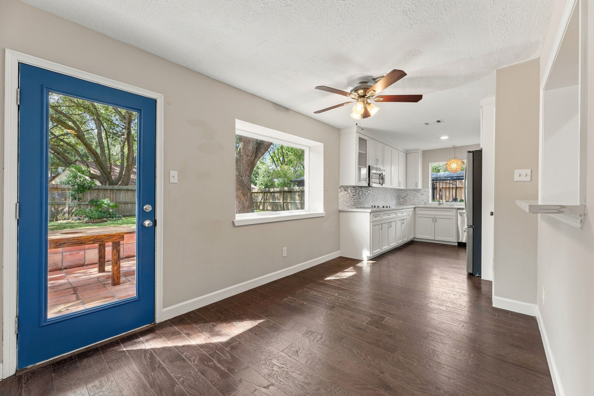Open kitchen and dining area with easy backyard access!