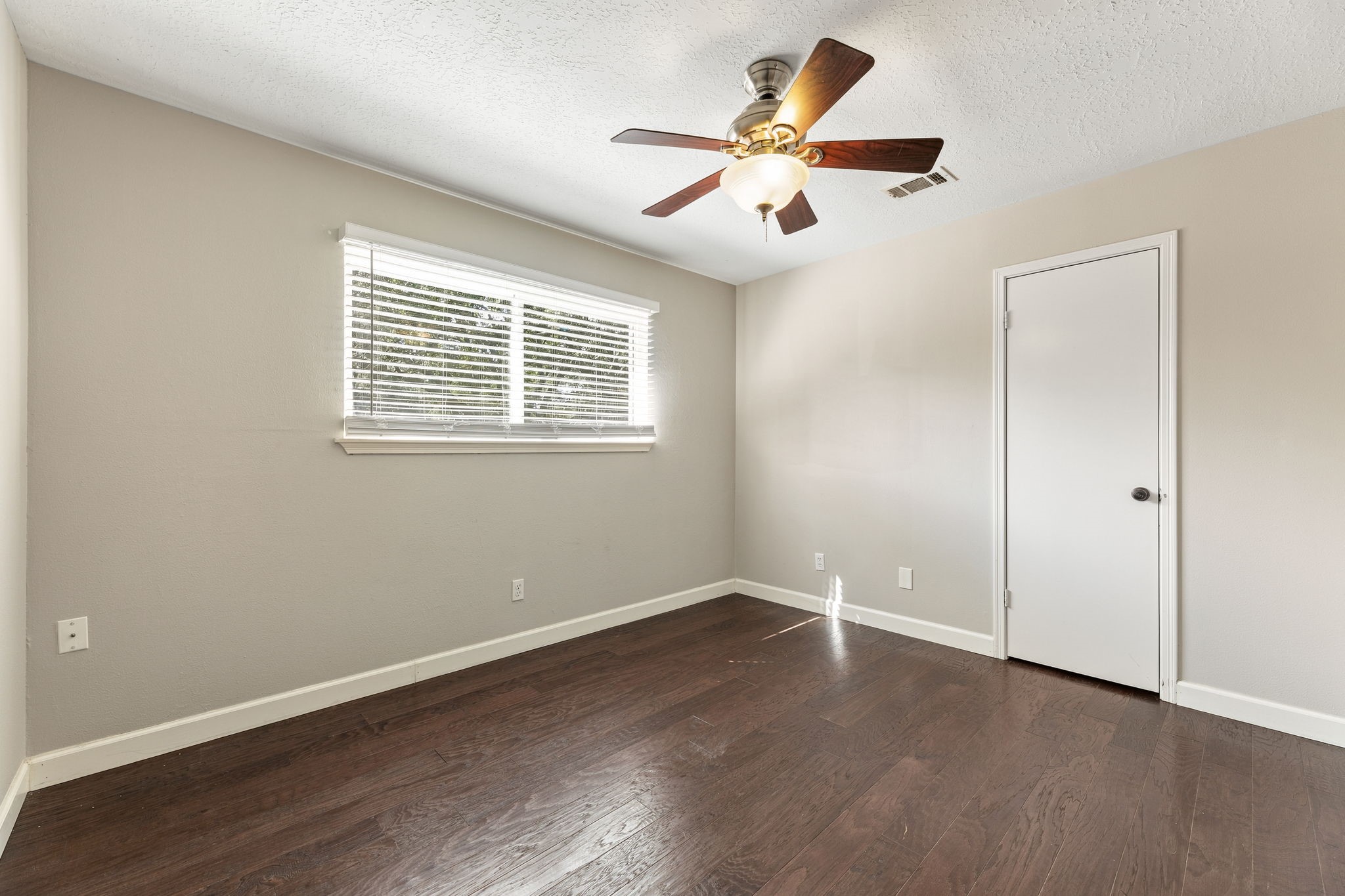 Comfortably sized secondary bedroom with great natural light!
