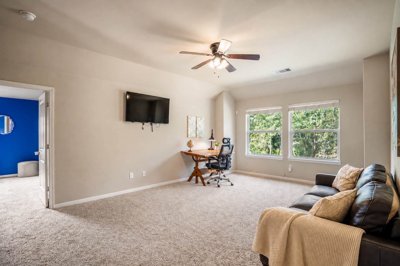 This angle shows the gameroom as it connects to the rest of the upstairs, with the doorway on the left leading into the secondary bedroom were heading to next.