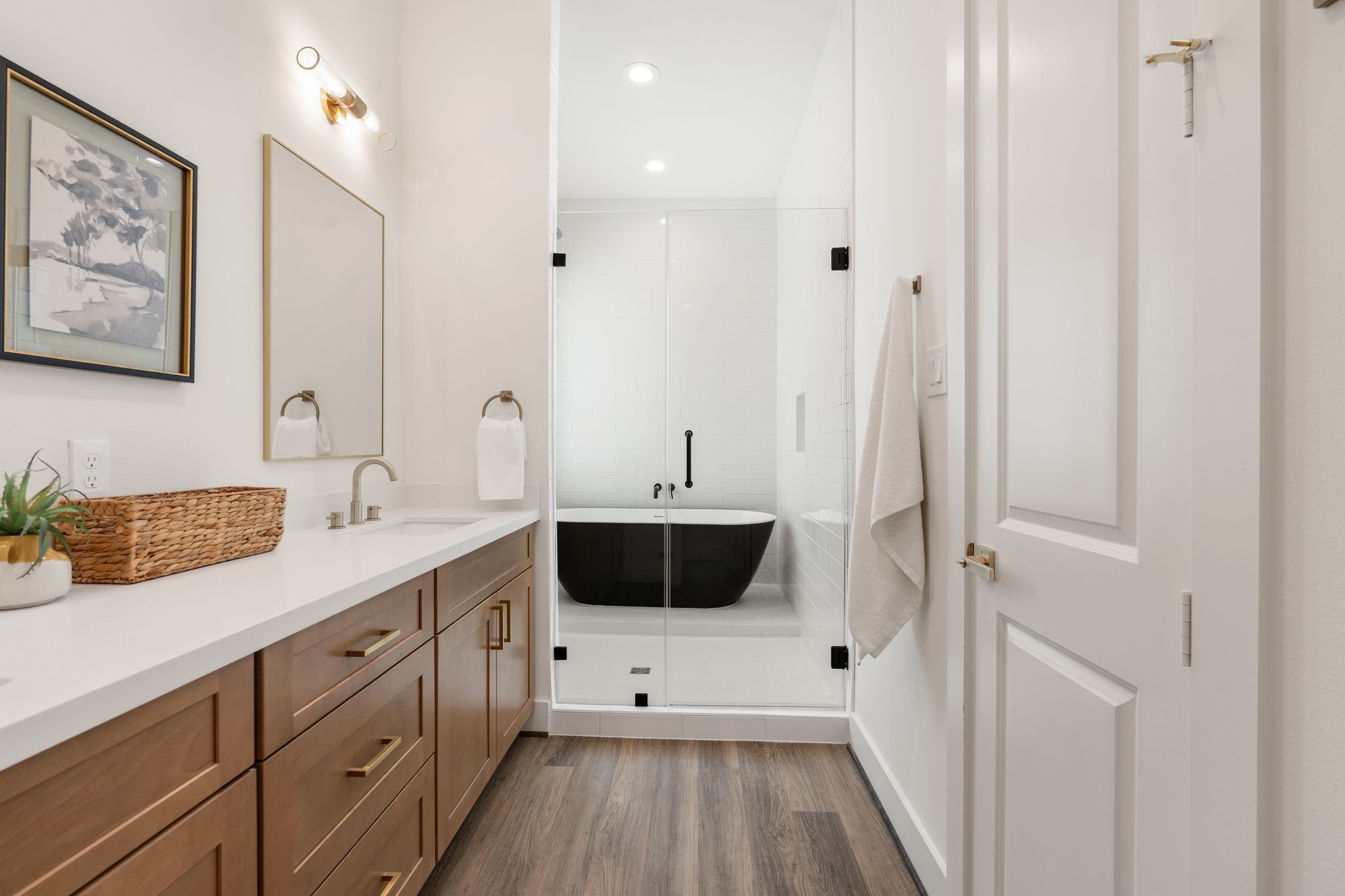dual vanities with wet room with with 5 head shower head!
