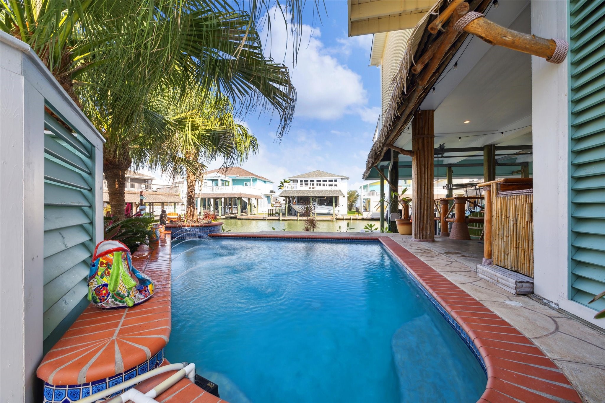 What a view! Water features in the pool add to the ambiance.