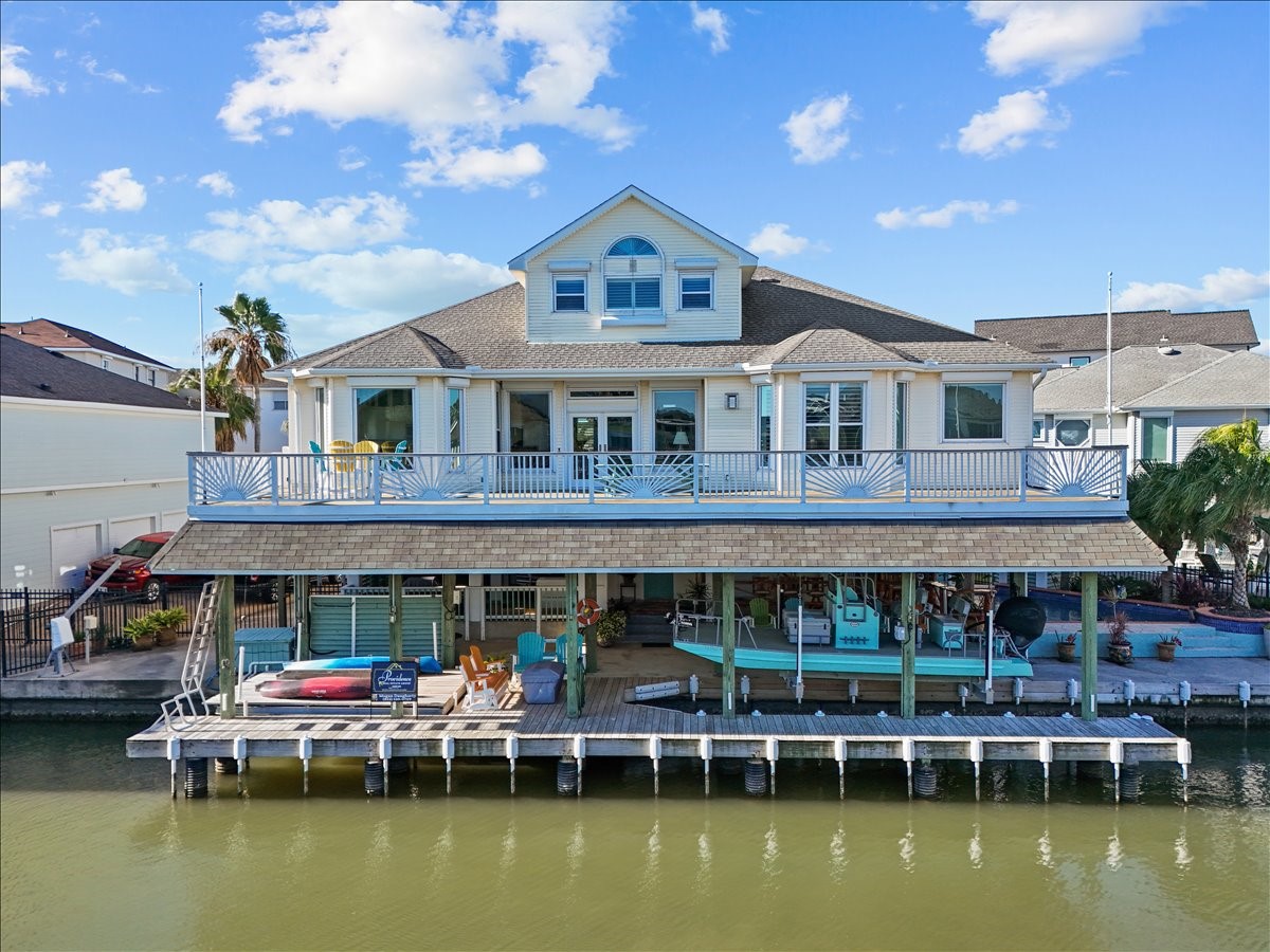 This canal front home in the community of Tiki Island offers everything you've been looking for! 3-4 bedrooms or office, upstairs gameroom, heated pool, two boat lifts, 150 gallon live bait well, stainless fish cleaning table with sink, 4 garages with one converted to a storage/workshop with half bath plus an updated elegant interior design. There are too many upgrades to mention.
