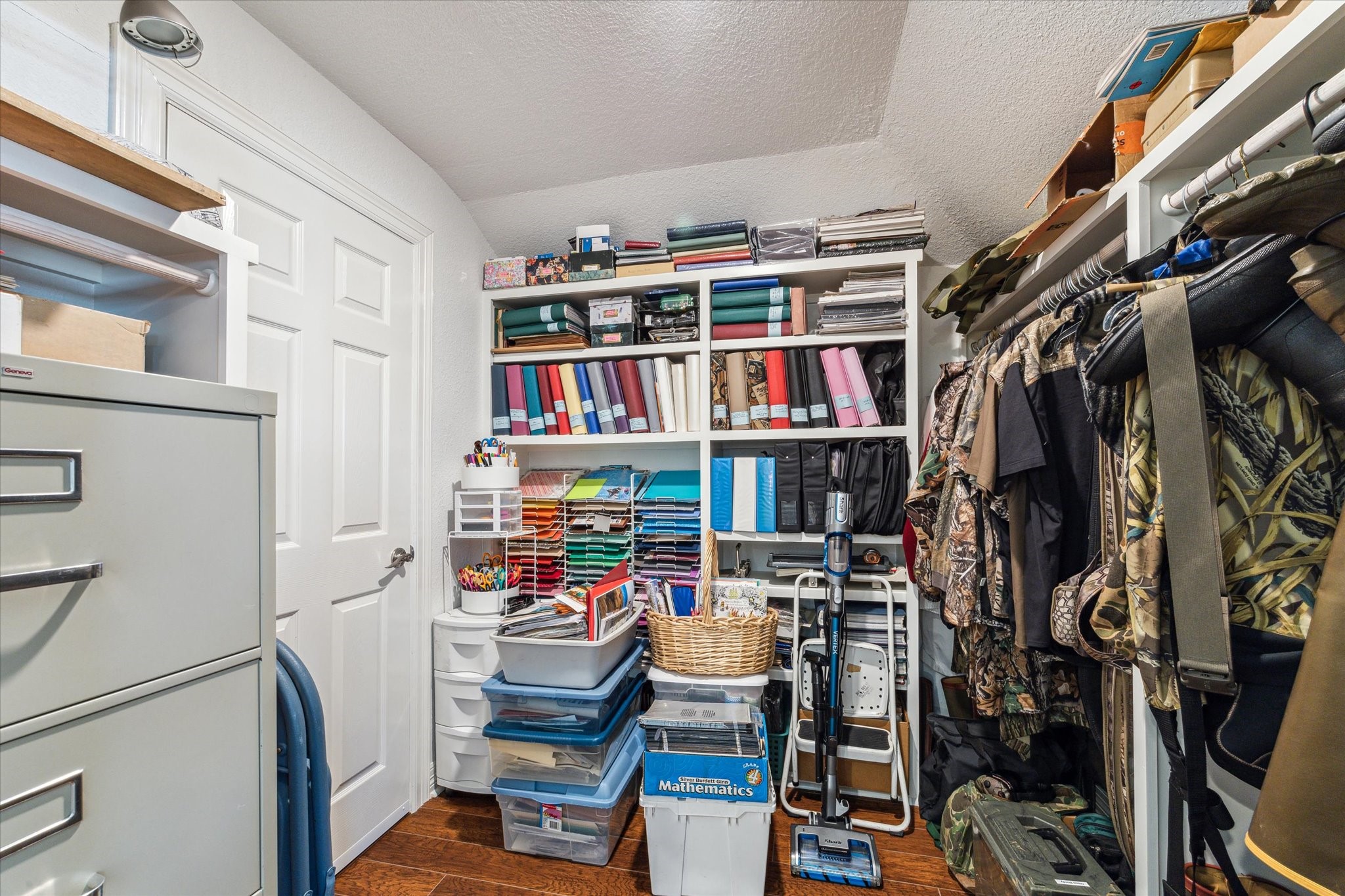 This is the oversized 10x10 walk-in closet upstairs perfect for extra storage, crafting supplies or whatever your needs may be. There is also access to the attic in this room.