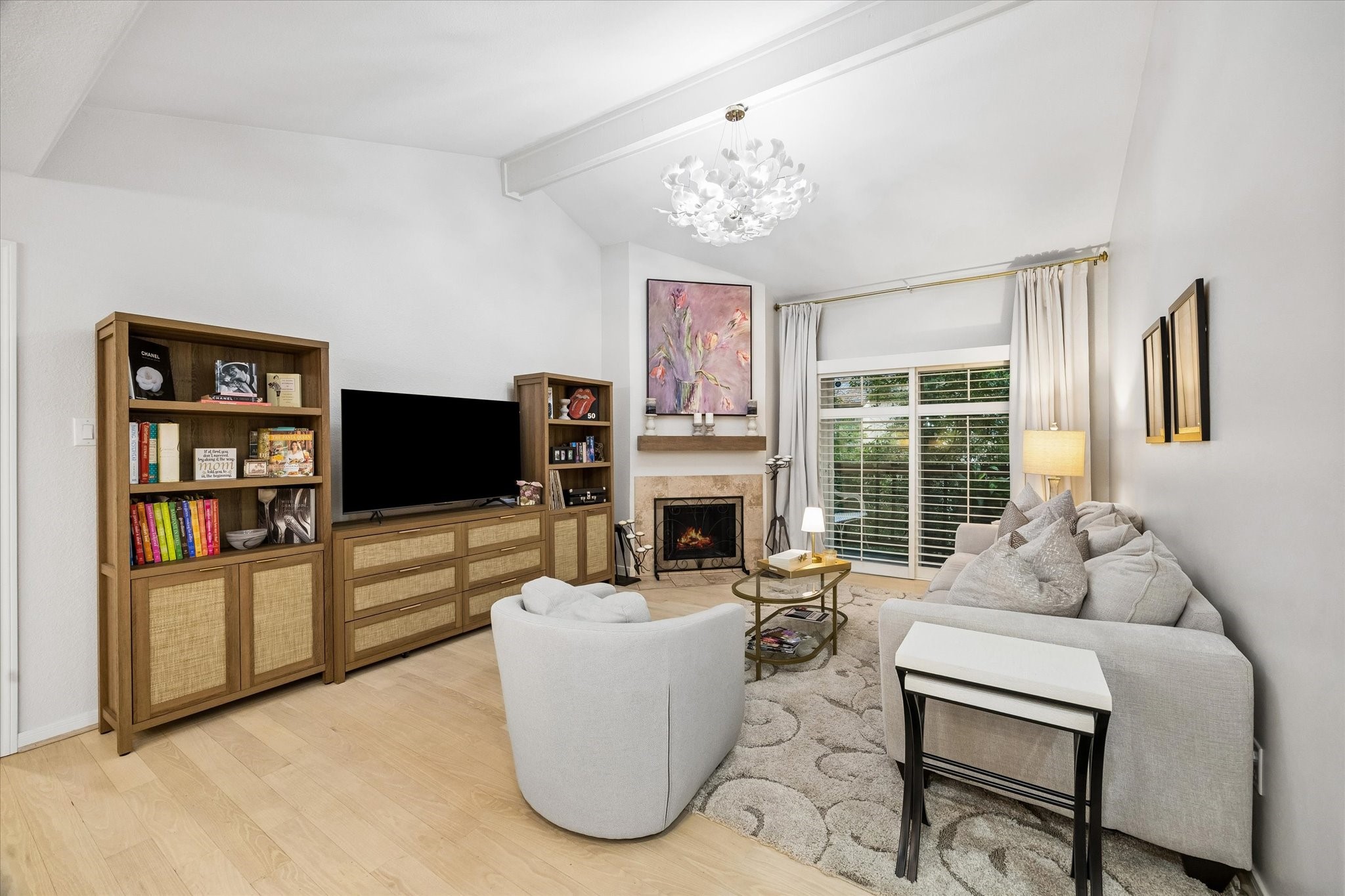 Living room with fireplace and view of balcony which is serene - feel like you are living in a tree house Living room with fireplace and view of balcony which is serene - feel like you are living in a tree house