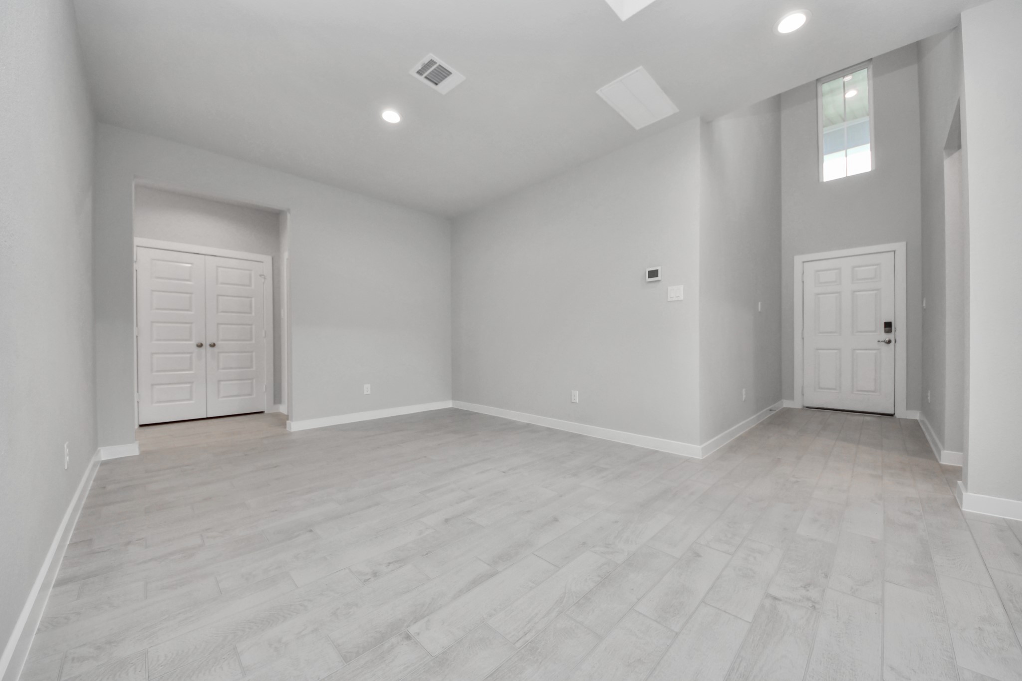 Craft enduring memories with loved ones around the table! This roomy dining area boasts stylish flooring, personalized paint, and is conveniently situated next to the family room and kitchen, fostering an open and inclusive ambiance. Sample photo of completed home with similar floor plan. Actual colors and selections may vary.