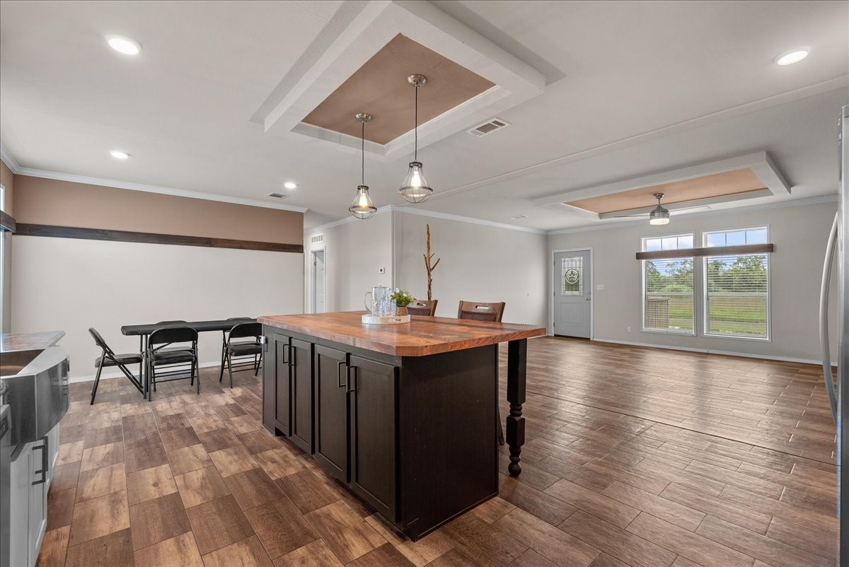 The roomy kitchen offers ample cabinet space, making organization and storage a breeze