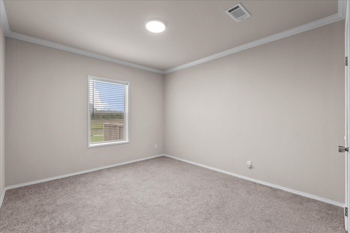 Second bedroom featuring ample natural lighting