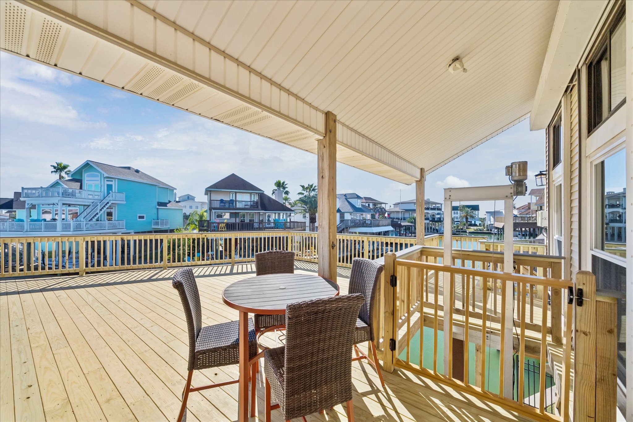Multiple seating areas let you choose sun or shade while enjoying the sights, sounds and breezes of waterfront living. The covered lift beside the entry makes bringing up groceries effortless.