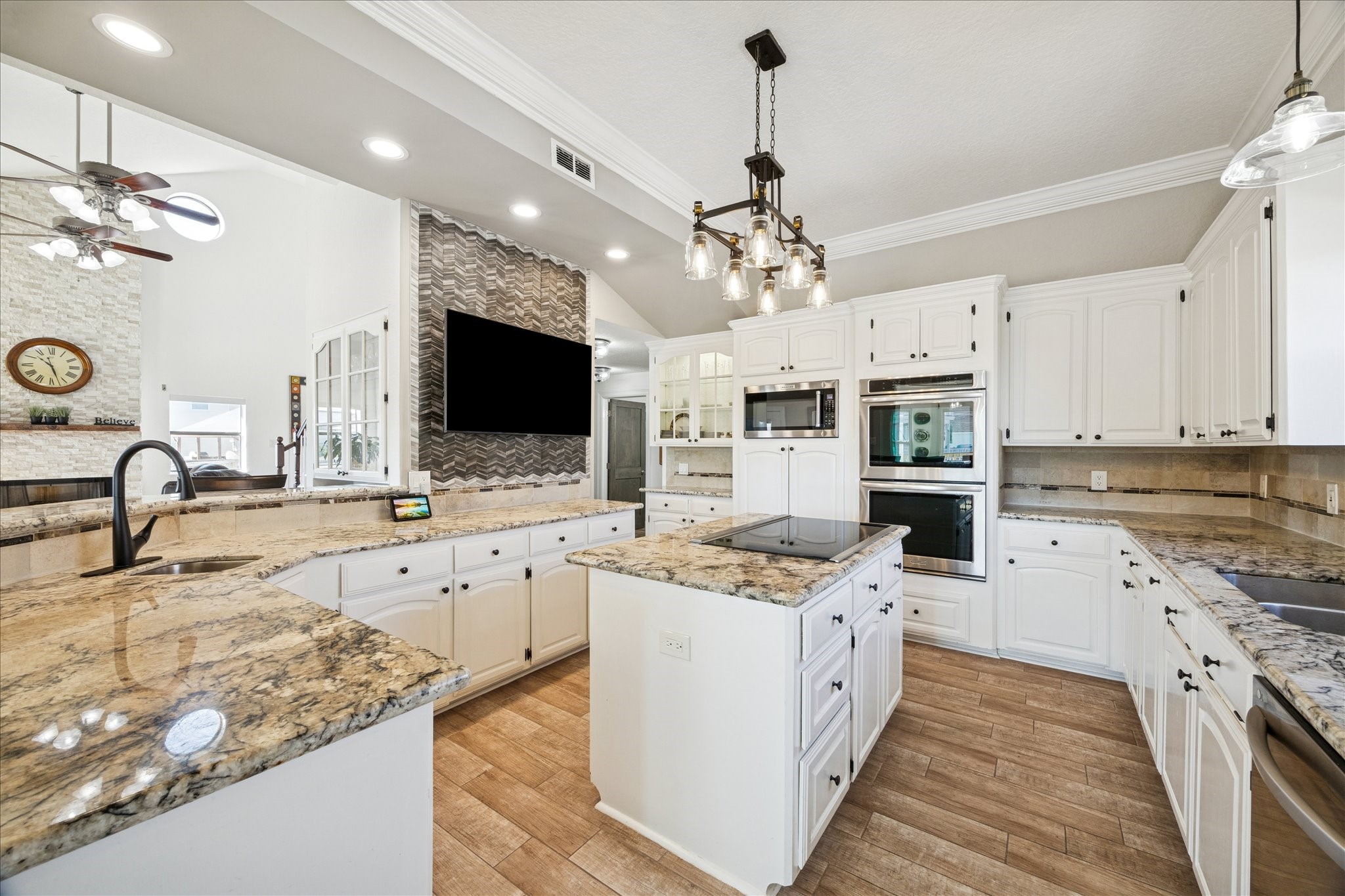 Bright and inviting, with a custom accent wall that draws the eye and gives the kitchen its own sense of style.