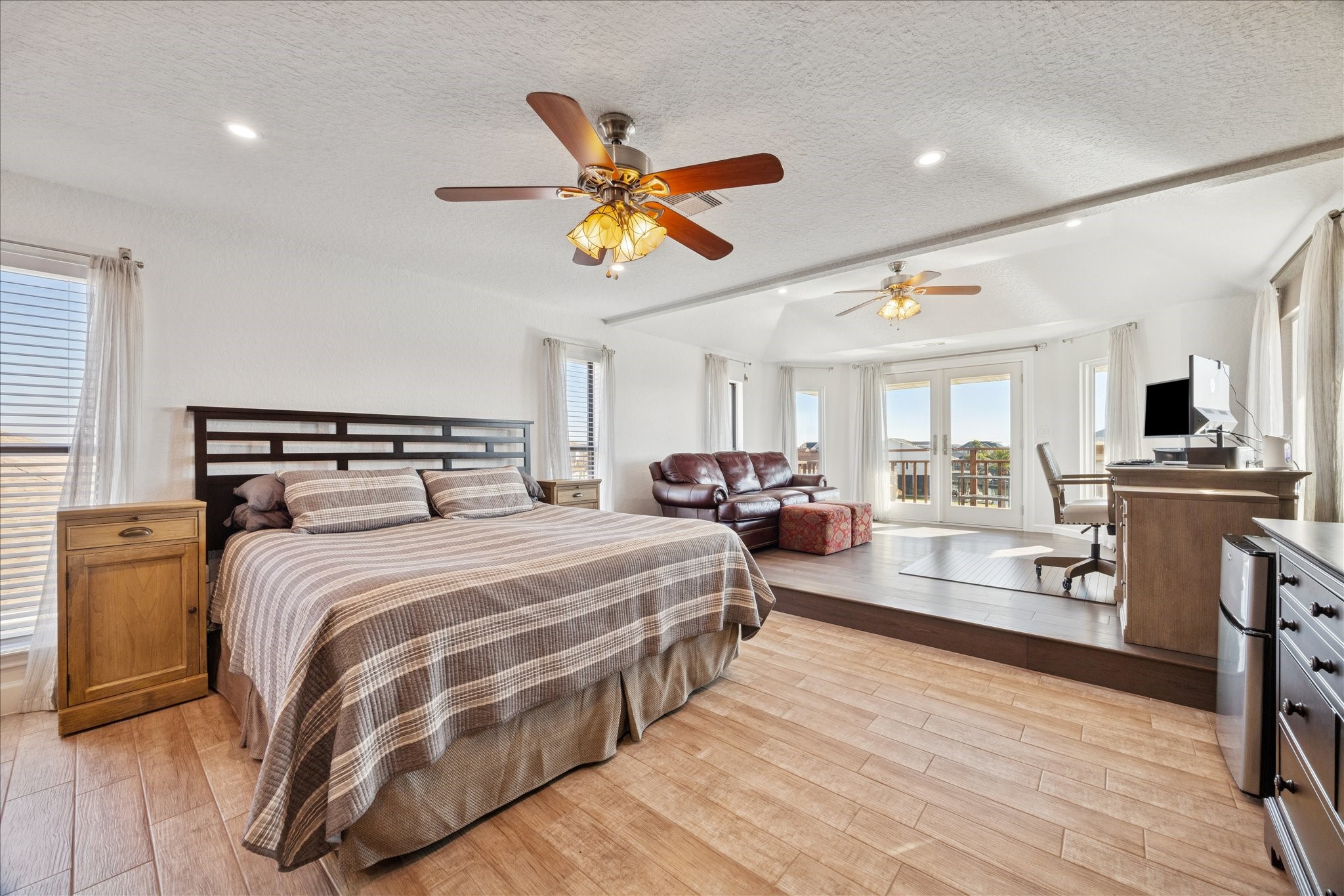 The primary bedroom delivers an immediate "wow" factor with its impressive scale and three-sided water views. For the current owners, this one-of-kind suite was the icing on the cake that ultimately sealed their decision to make this their home, and its lived up to every expectation.