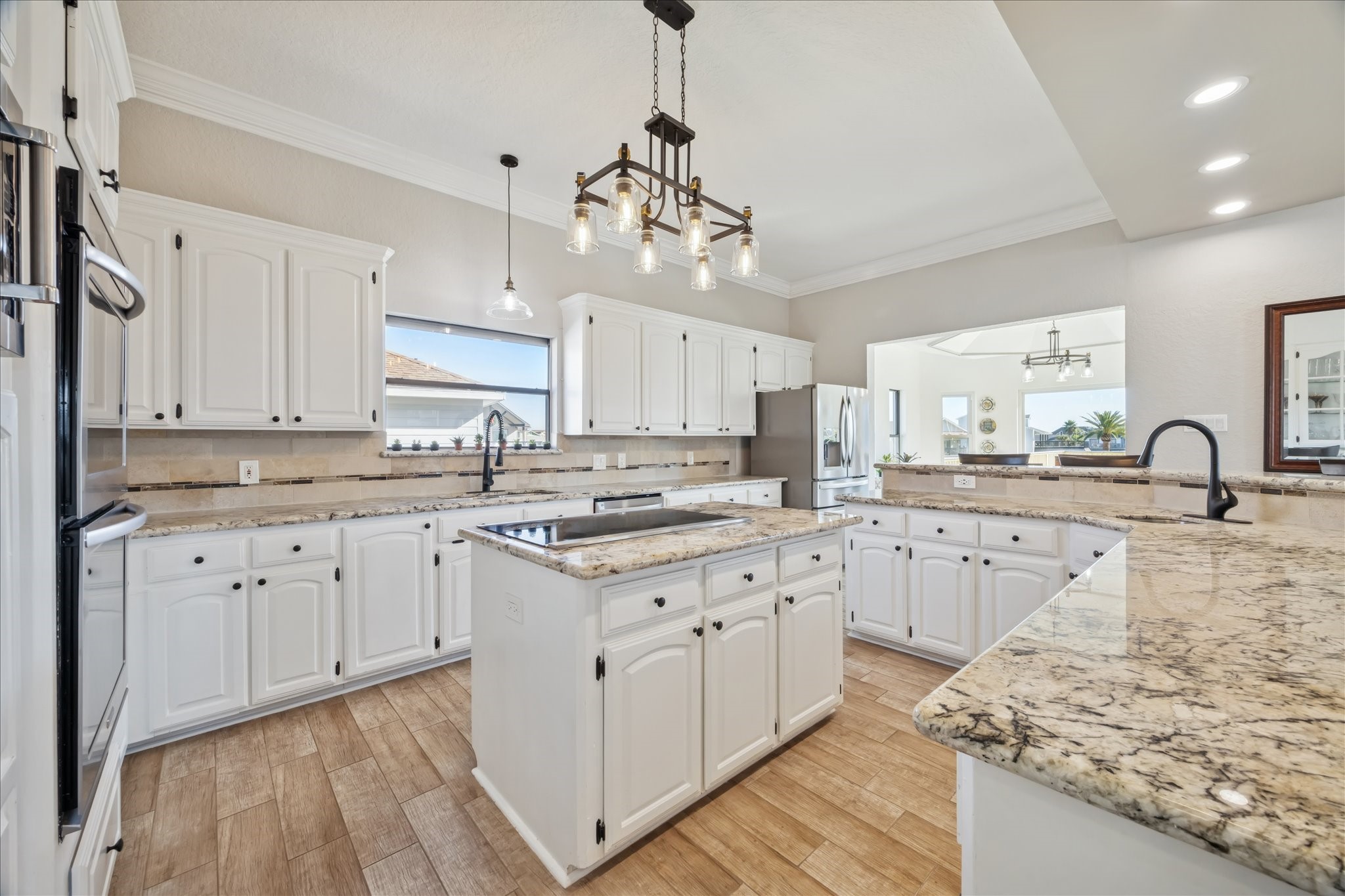 Spacious and thoughtfully laid out, this kitchen pairs generous counter space and storage with a large island, making cooking and daily living feel easy.