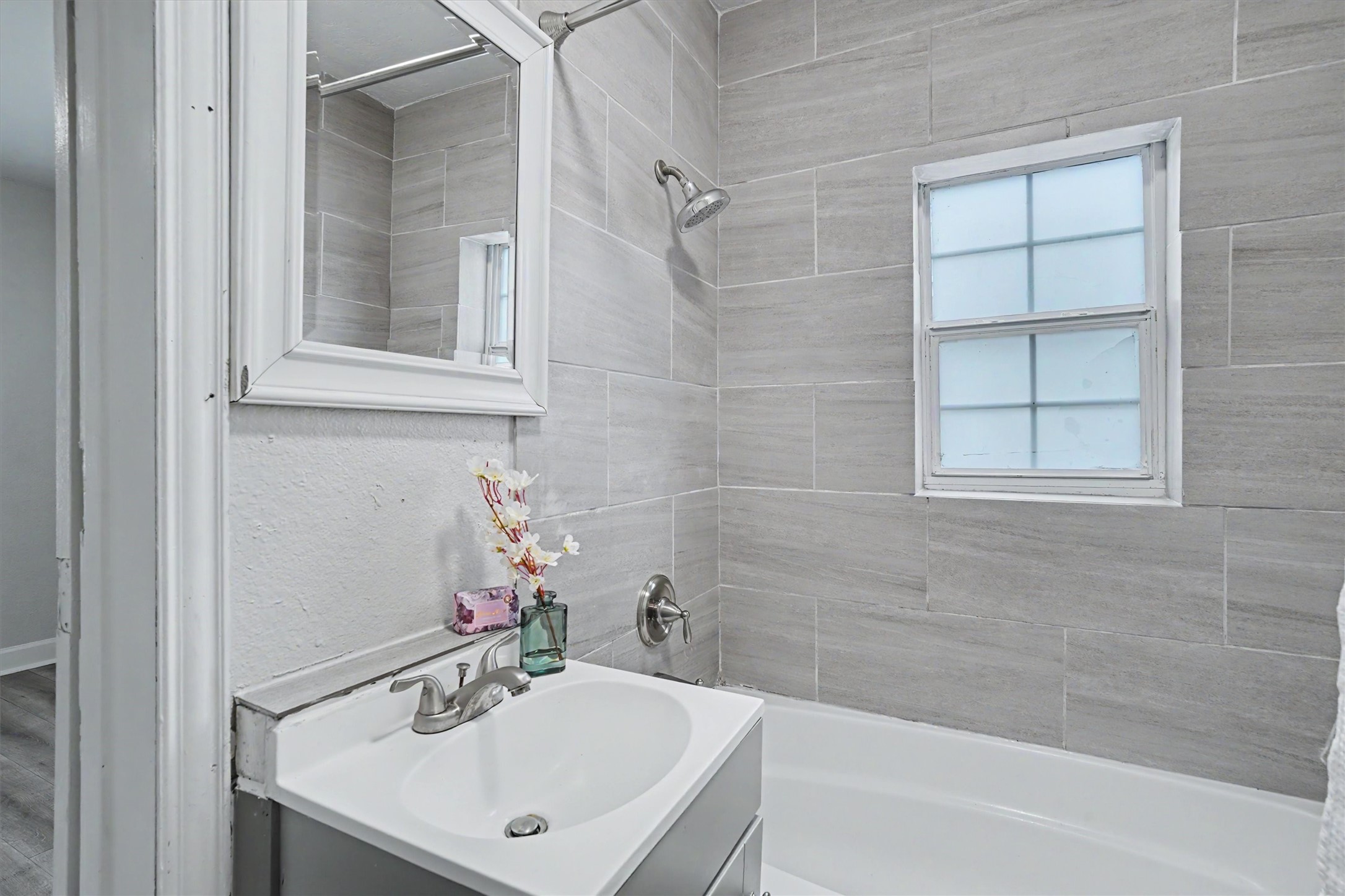 Another view of the primary bath, remodeled with new RedGard waterproofing and wall tile in 2022.