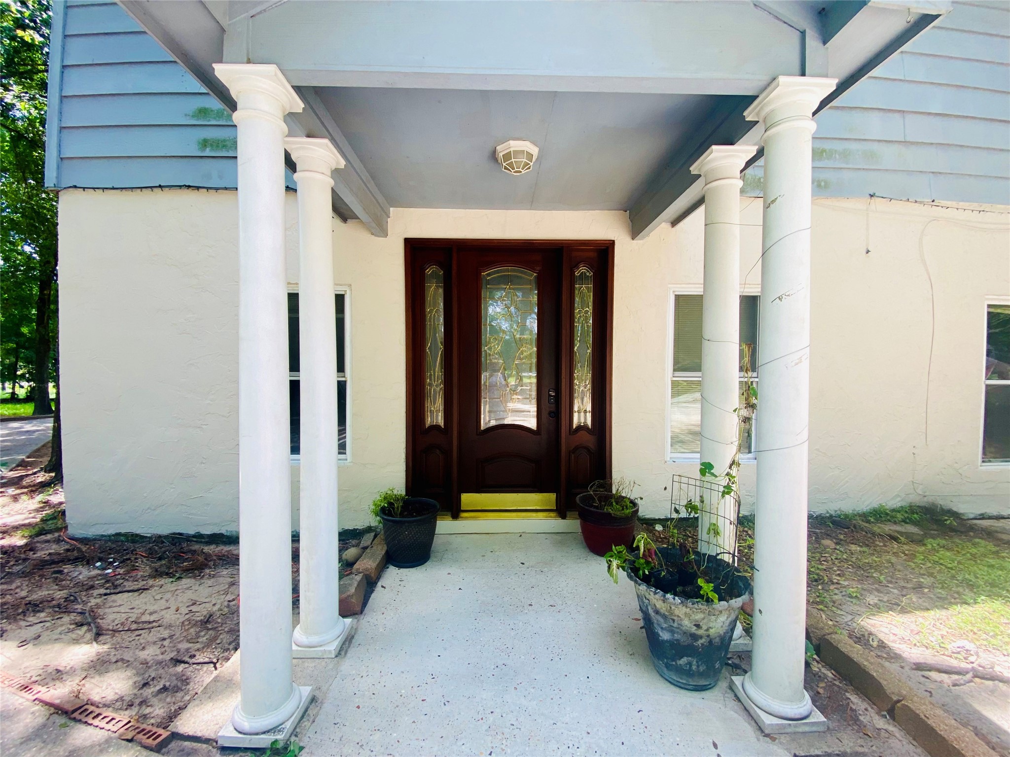 Front entry with small porch Front entry with small porch