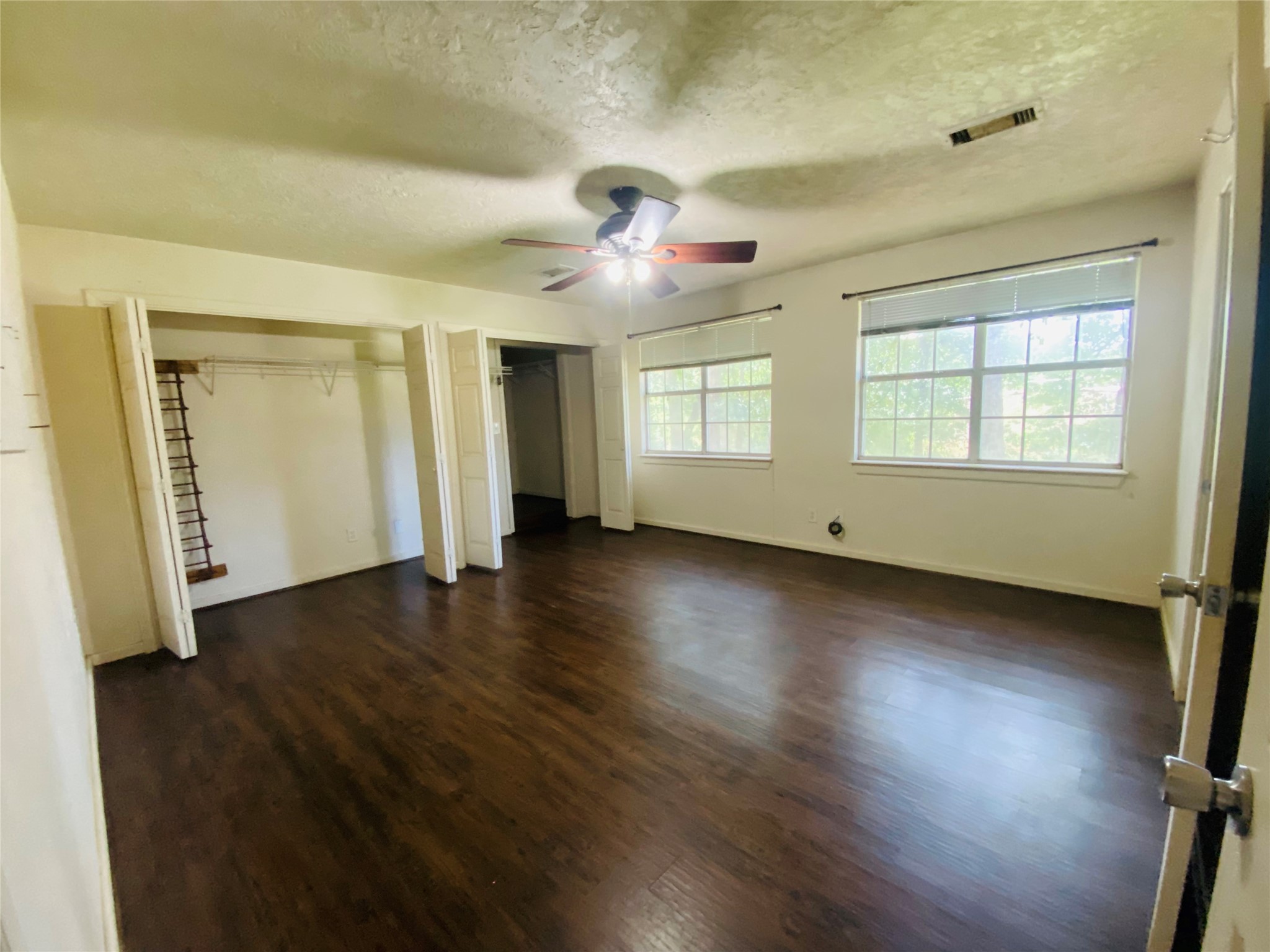 Primary bedroom is first bedroom to the left