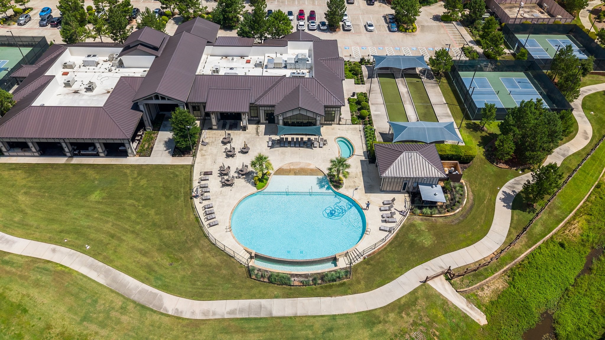 Aerial view of outdoor pool and amenity center