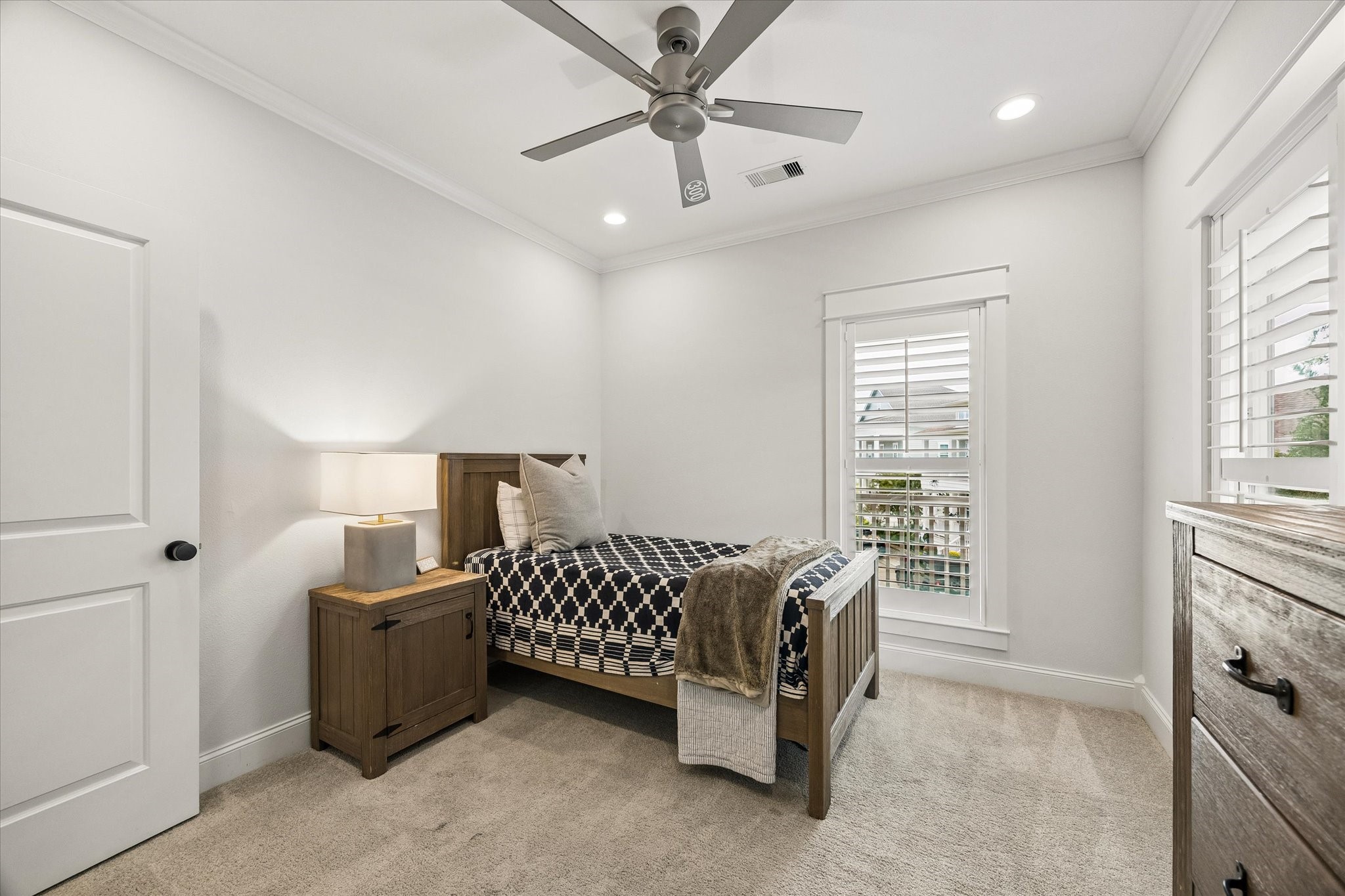 Fourth bedroom. Balcony views. built-in closets