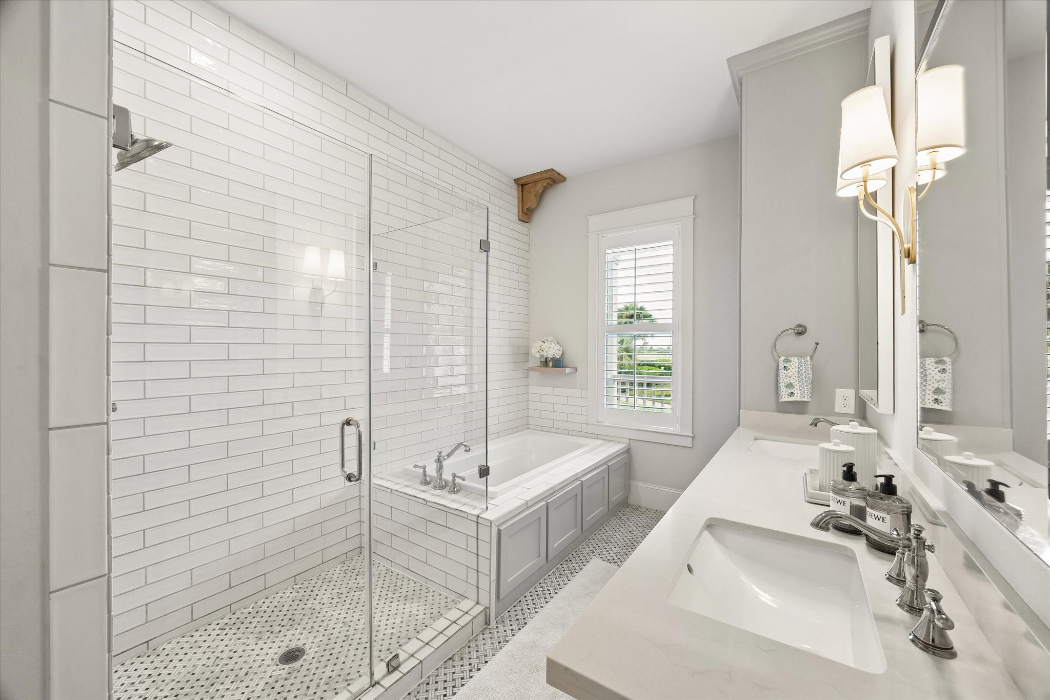 Custom shower with separate tub. Double vanity sinks