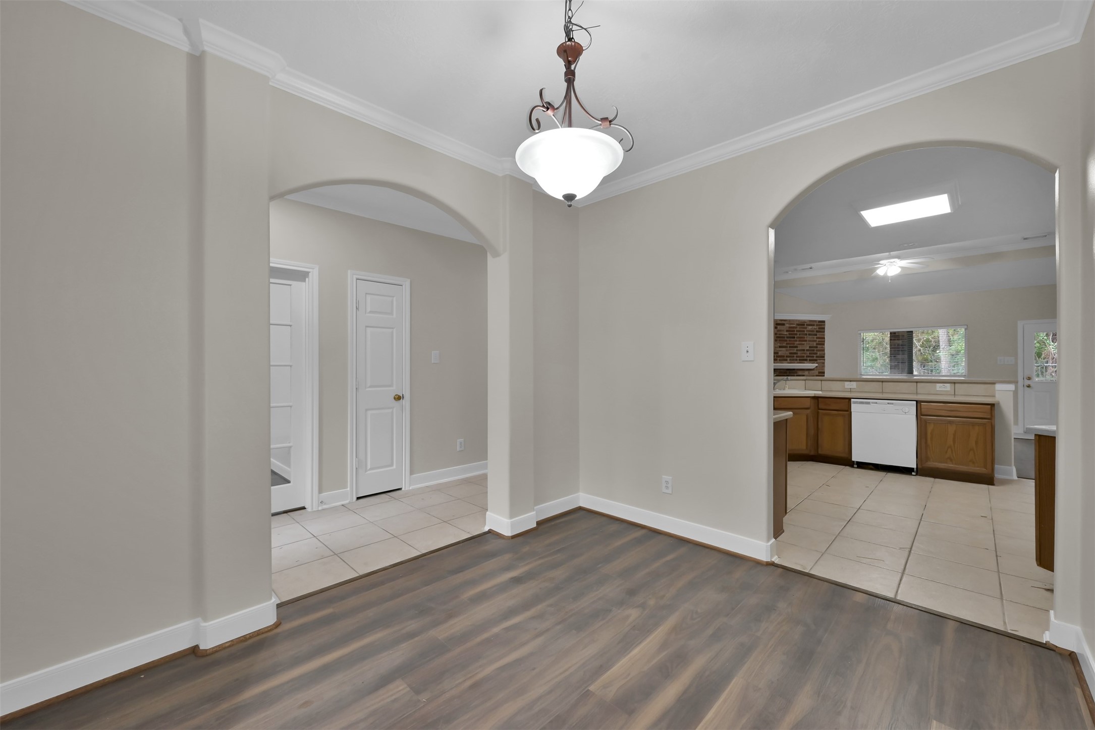 The Dining room is to the right upon entry. And a little view of the kitchen.