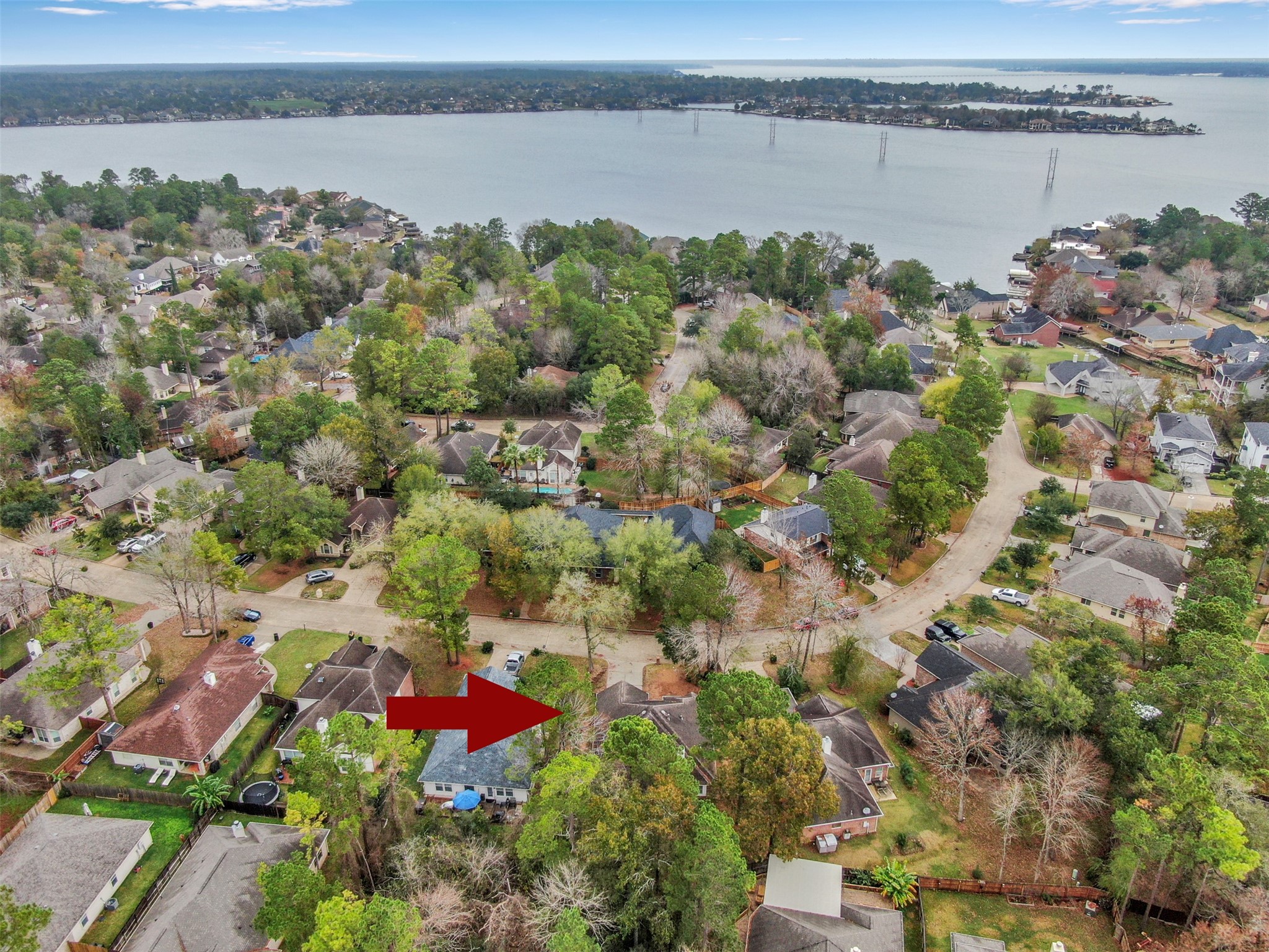 Aerial of the house and Lake Conroe.