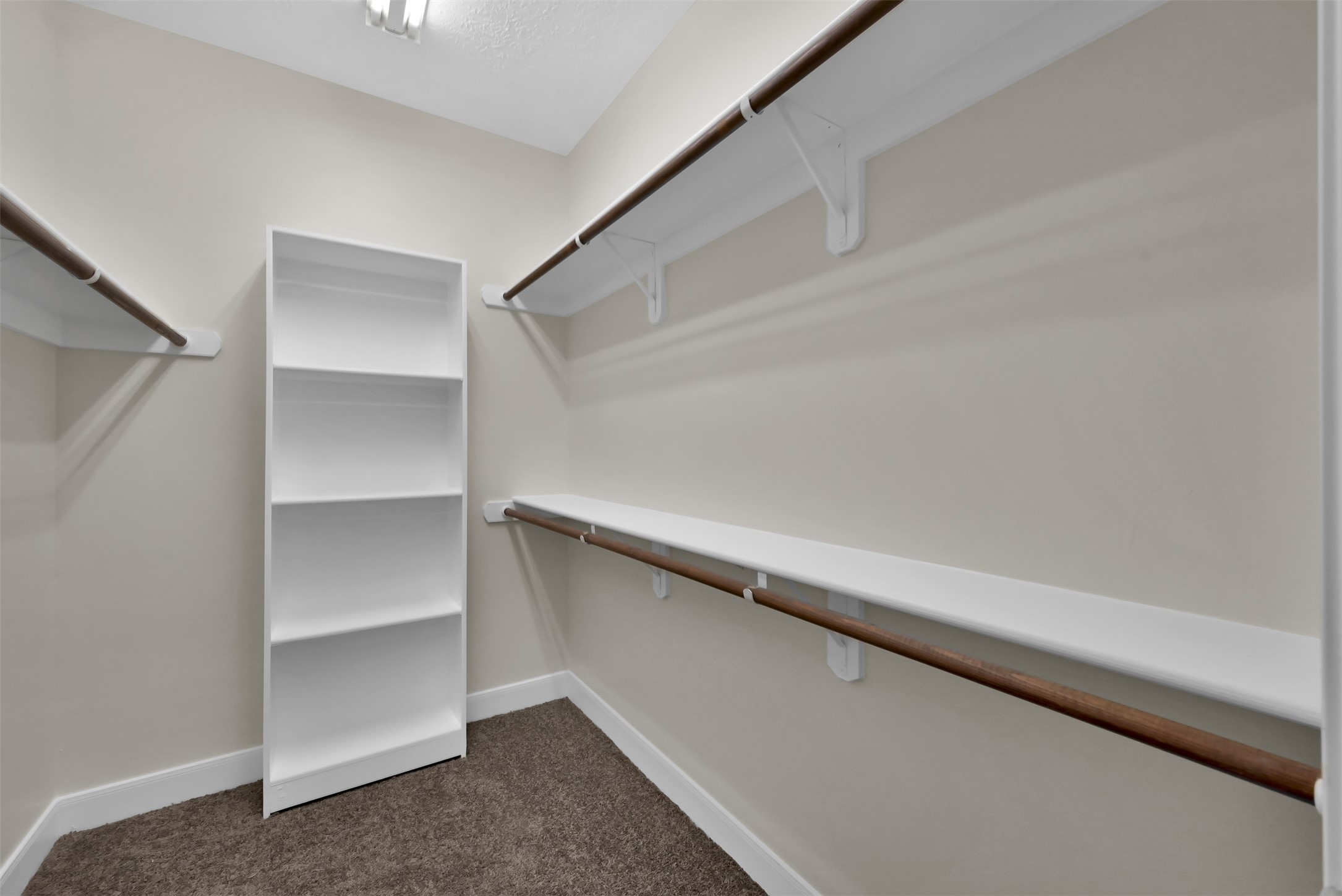Primary Bedroom walk in closet.