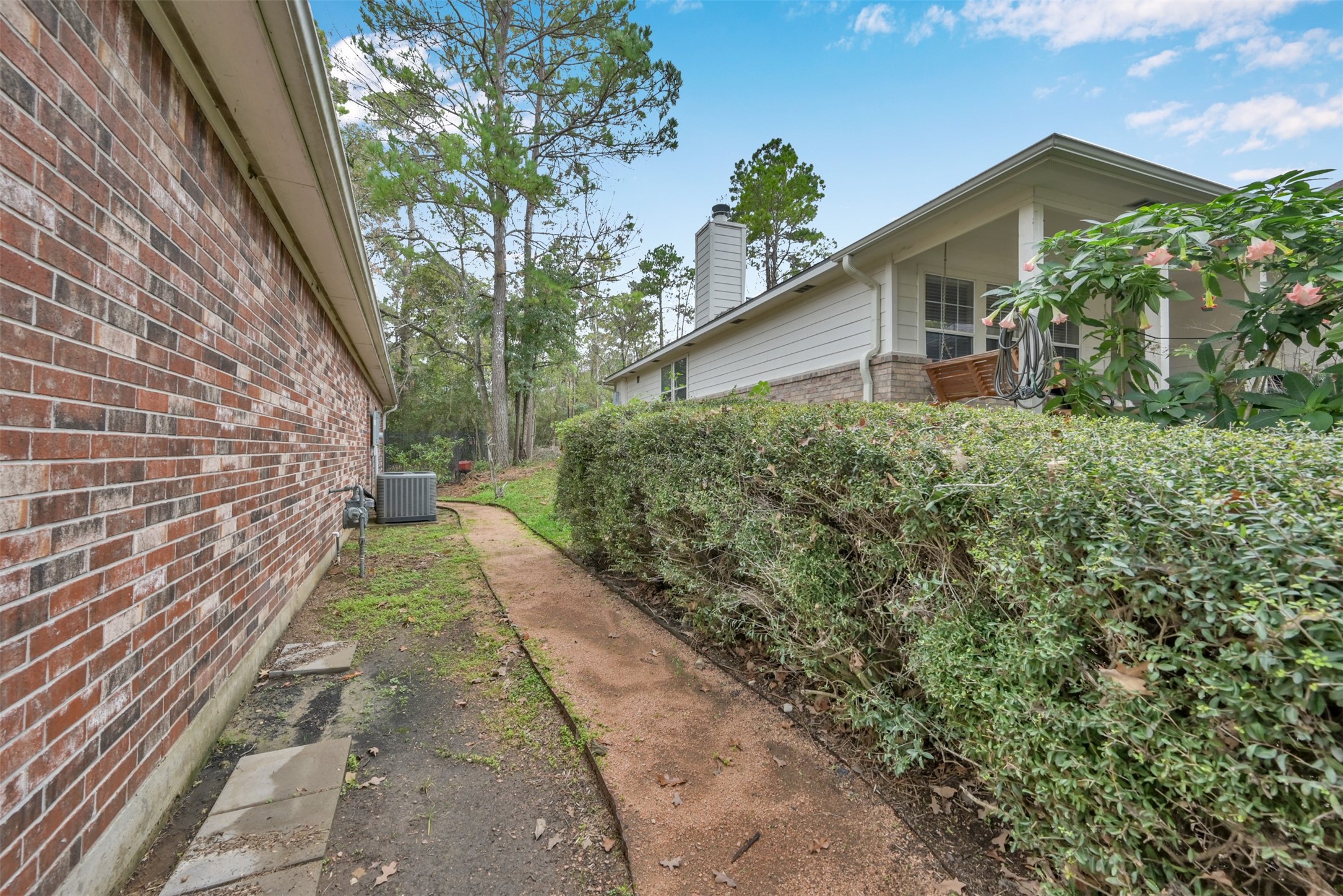 Left side of the house, walk way to back yard.