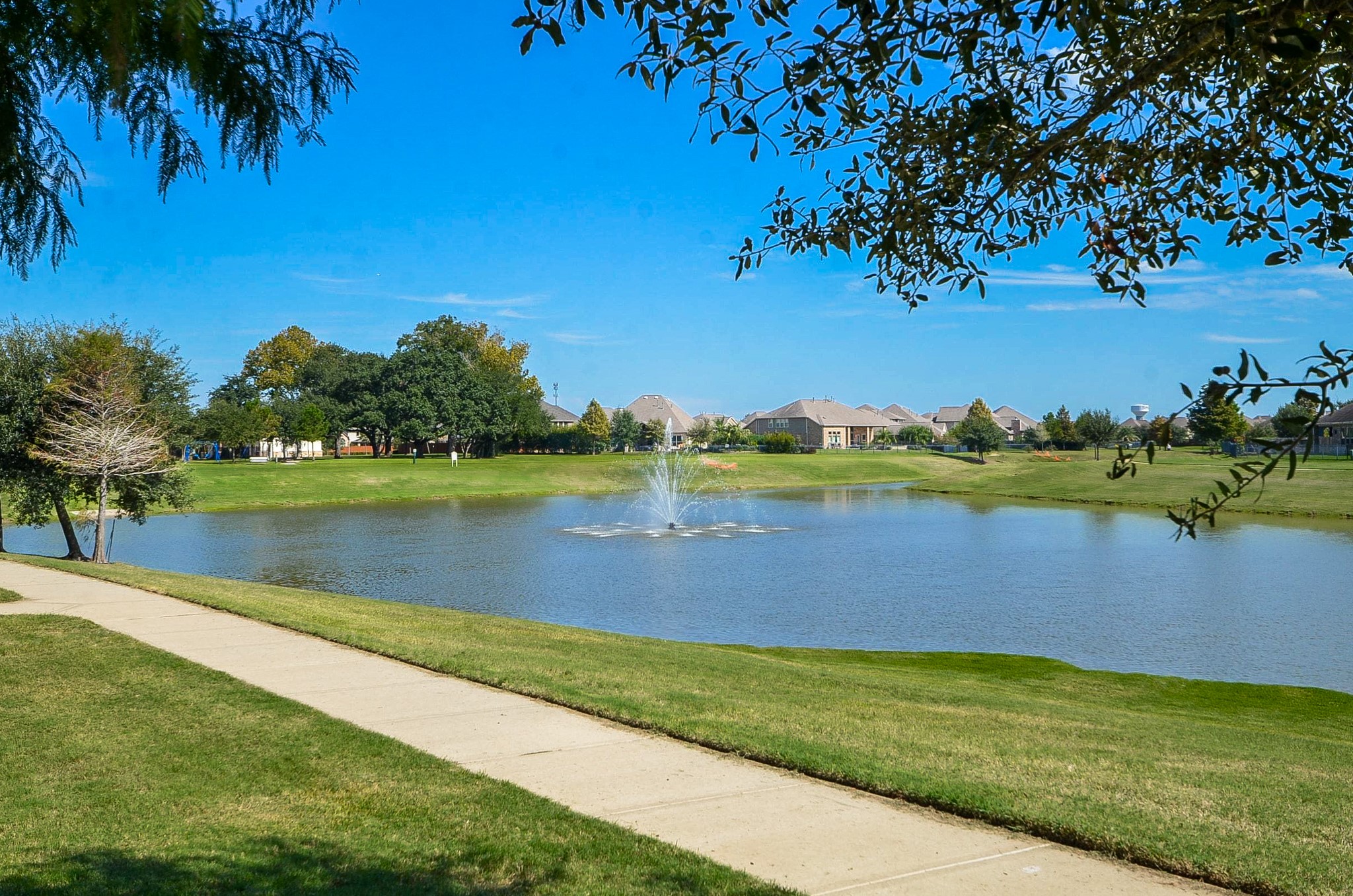 Enjoy morning and evening strolls along the scenic walking paths located just steps from your backyard!