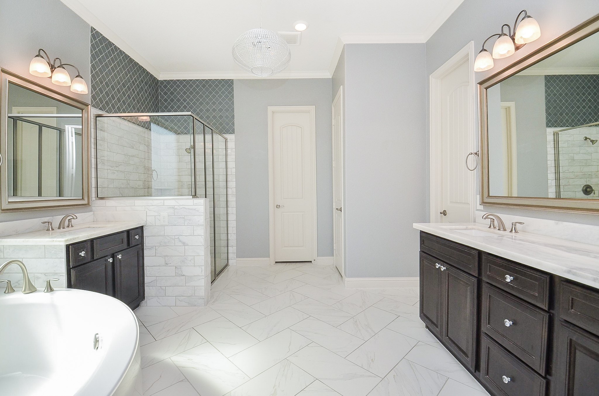 His and her vanity with dual sinks and ample storage!