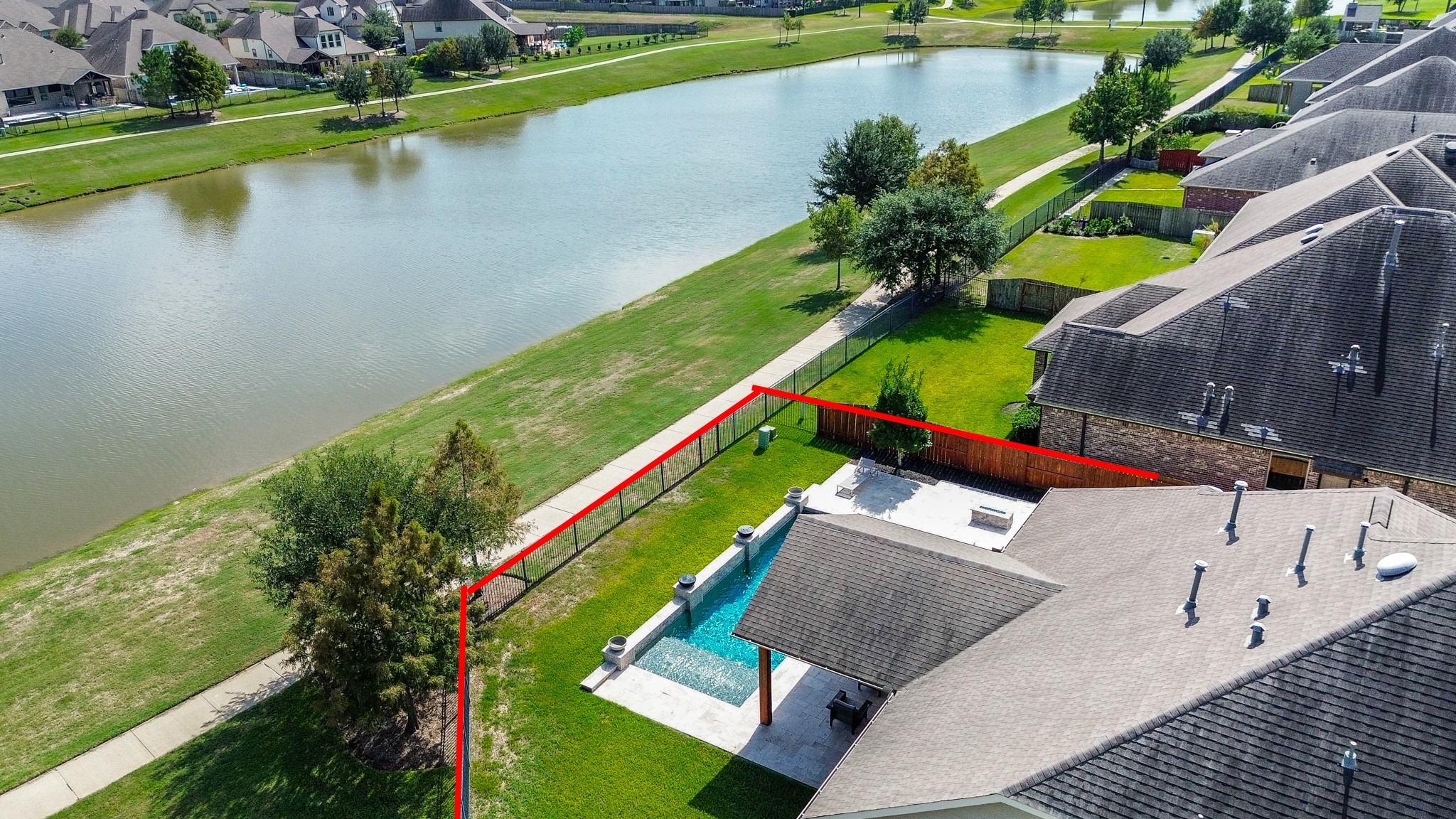 Aerial view of the lake just steps from the property!
