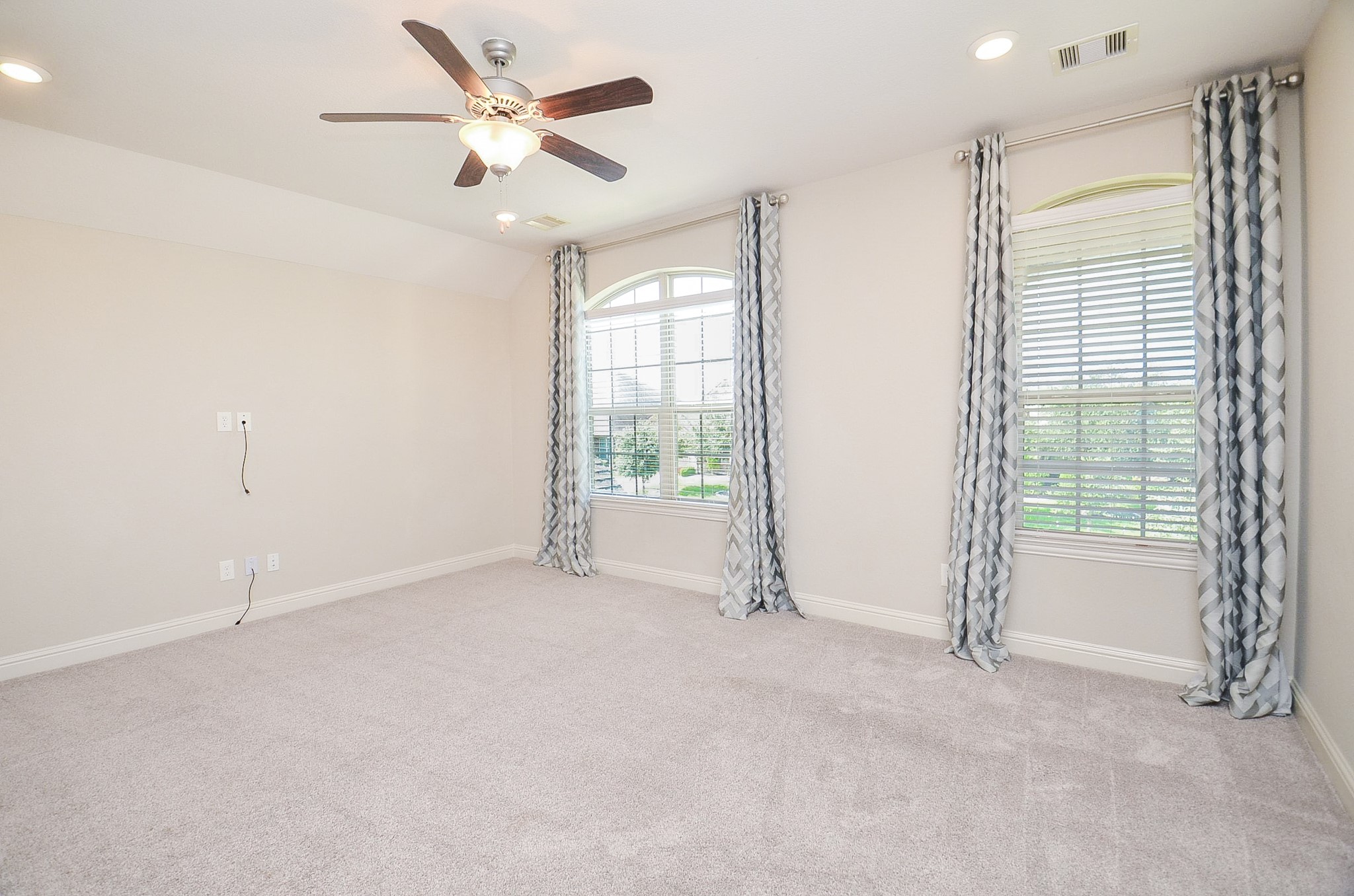 Spacious upstairs gameroom, perfect for use as a dedicated kids' playroom or a versatile entertainment space for guests!