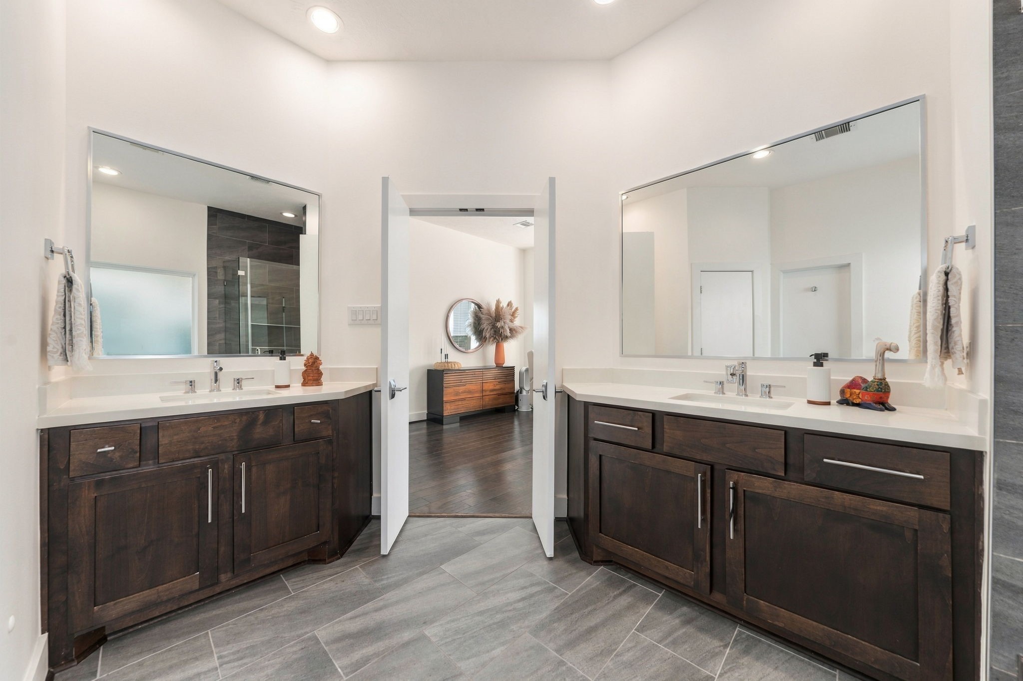 Primary bathroom with separated double vanities