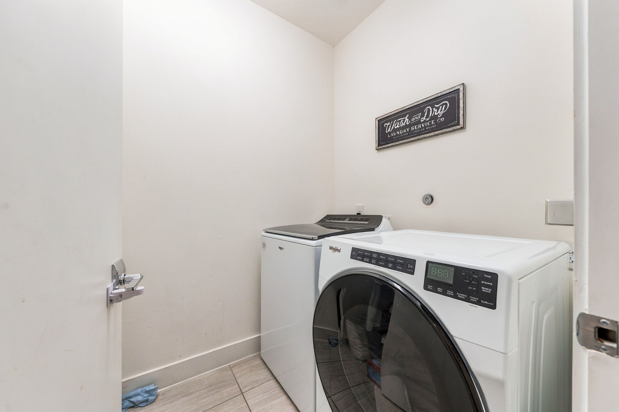 Large utility room on the 2nd floor with tons of storage space to the left