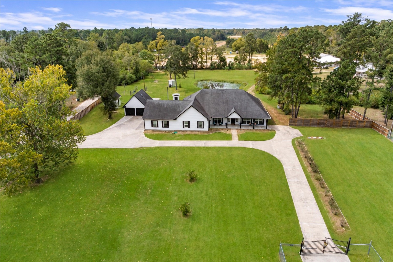 Welcome to 16144 Firetower Rd! Situated on 1.77 acres, this spacious single-story home offers an expansive lawn, mature trees, and peaceful views of a neighboring pond.