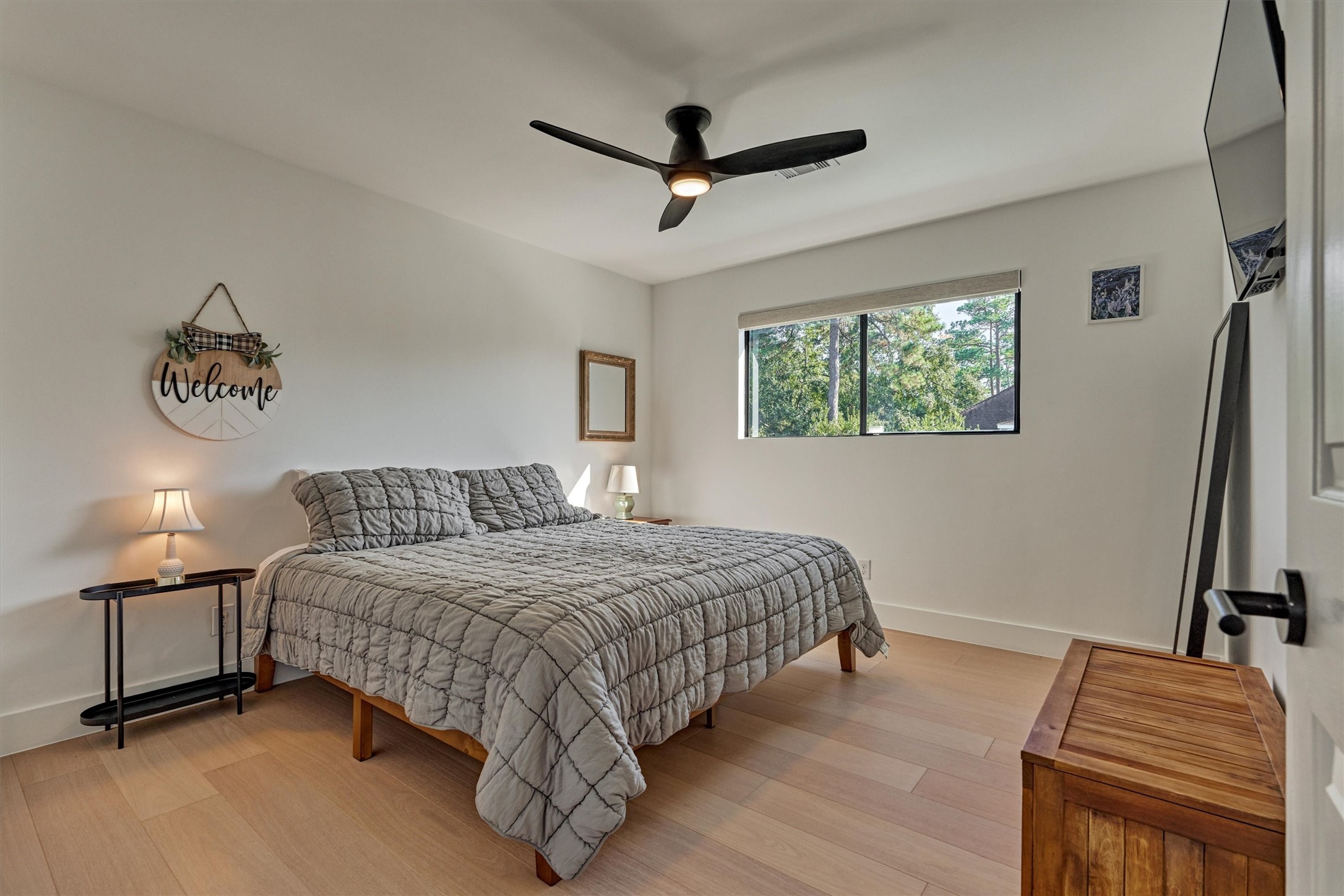 Bedroom 2 is the first of three upstairs bedrooms and can easily accommodate large furniture. Note the upgraded ceiling fan for added comfort.