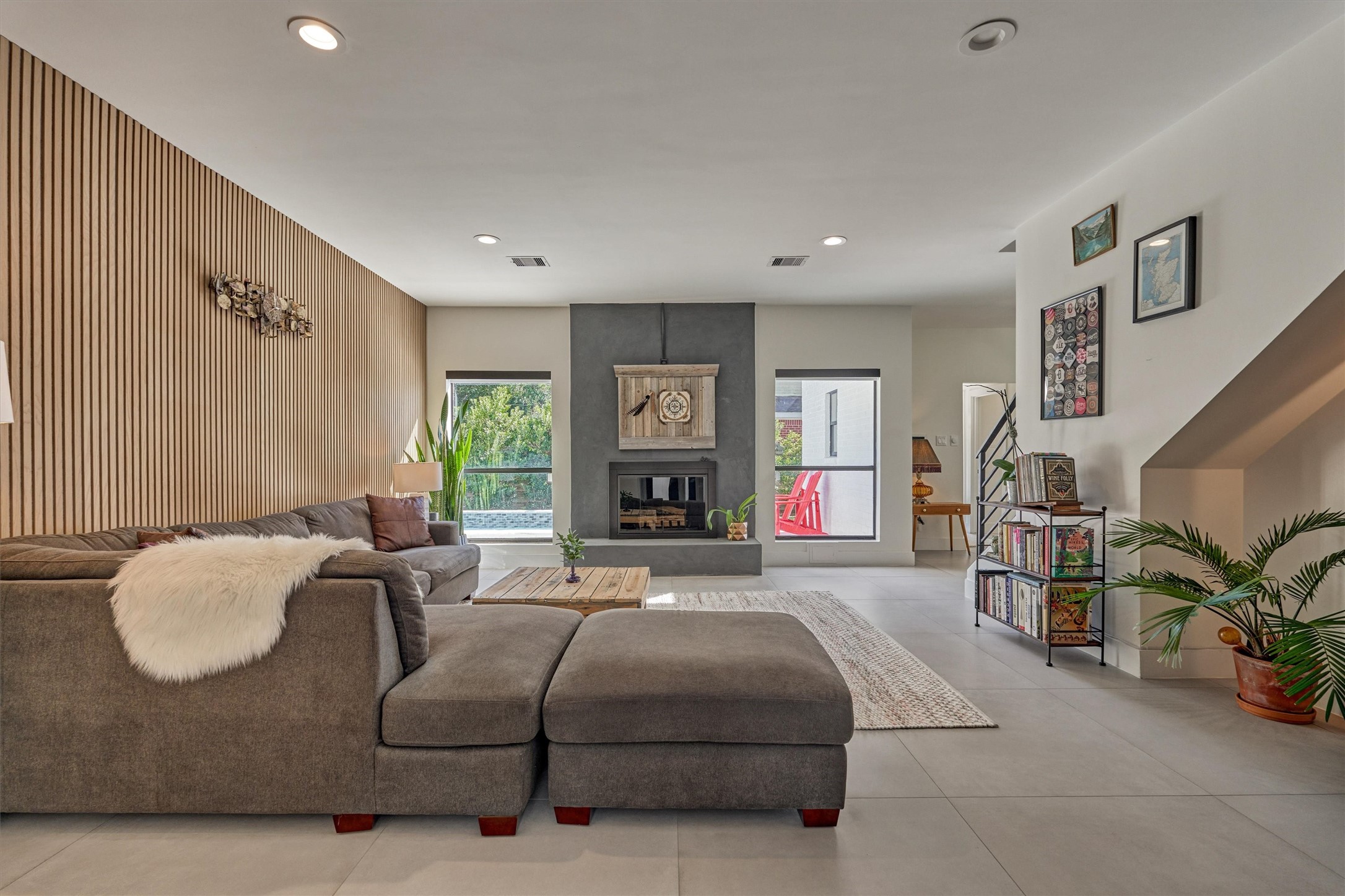 Wall of windows overlooks the backyard oasis!