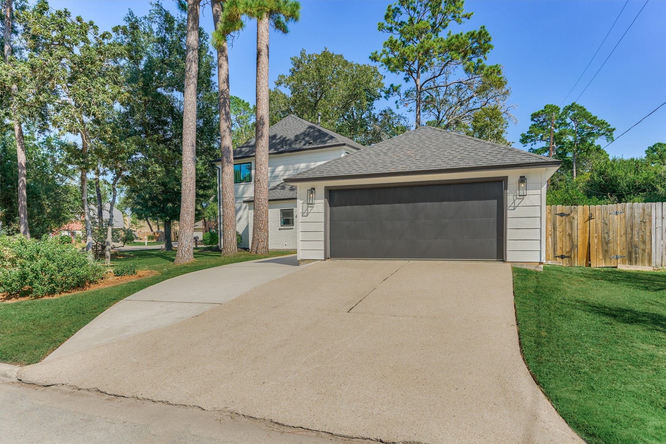 Detached garage with side entry on this sprawling corner lot! Bonus storage options inside!