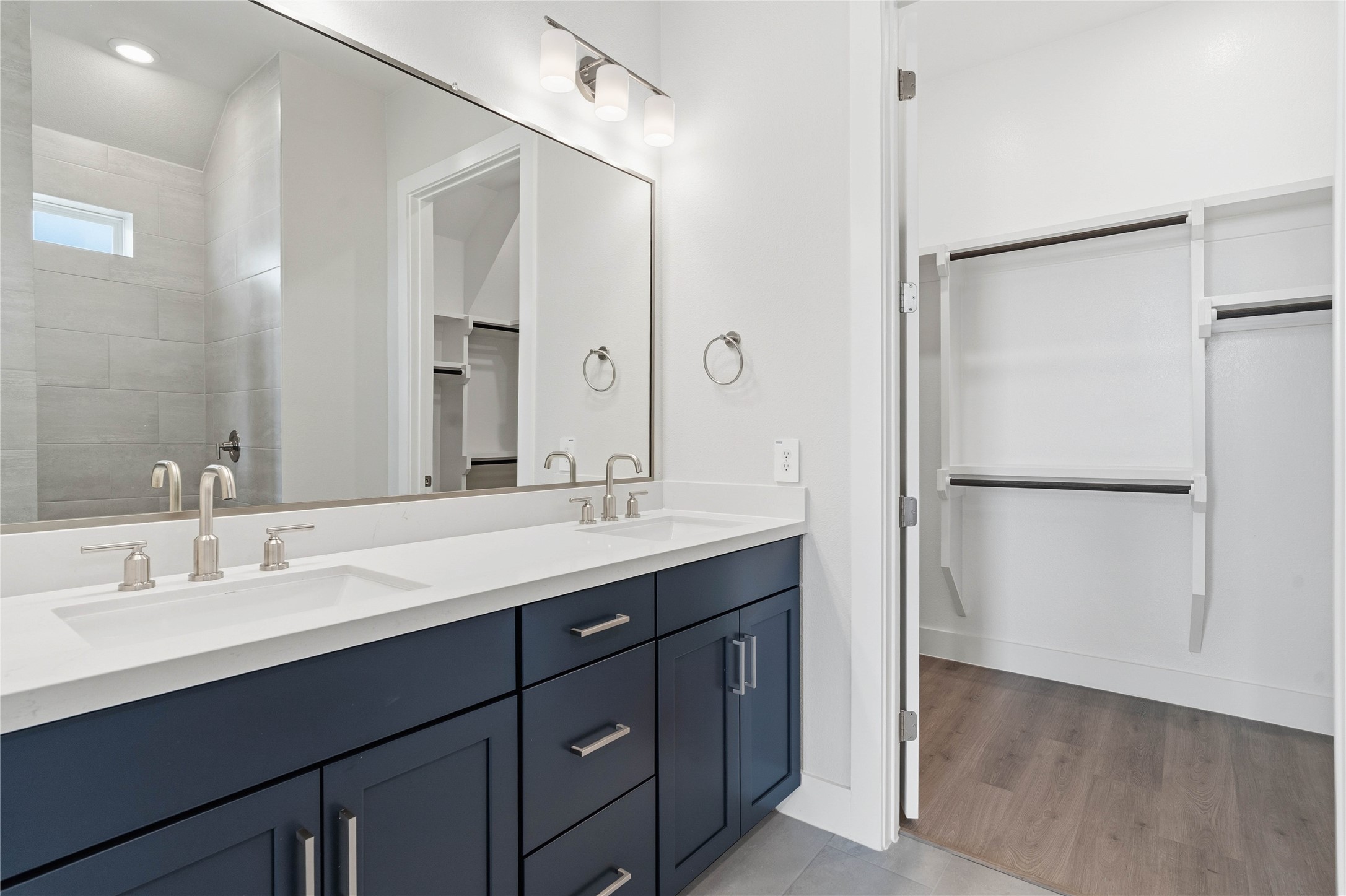 The connecting walk-in closet makes getting ready convenient.