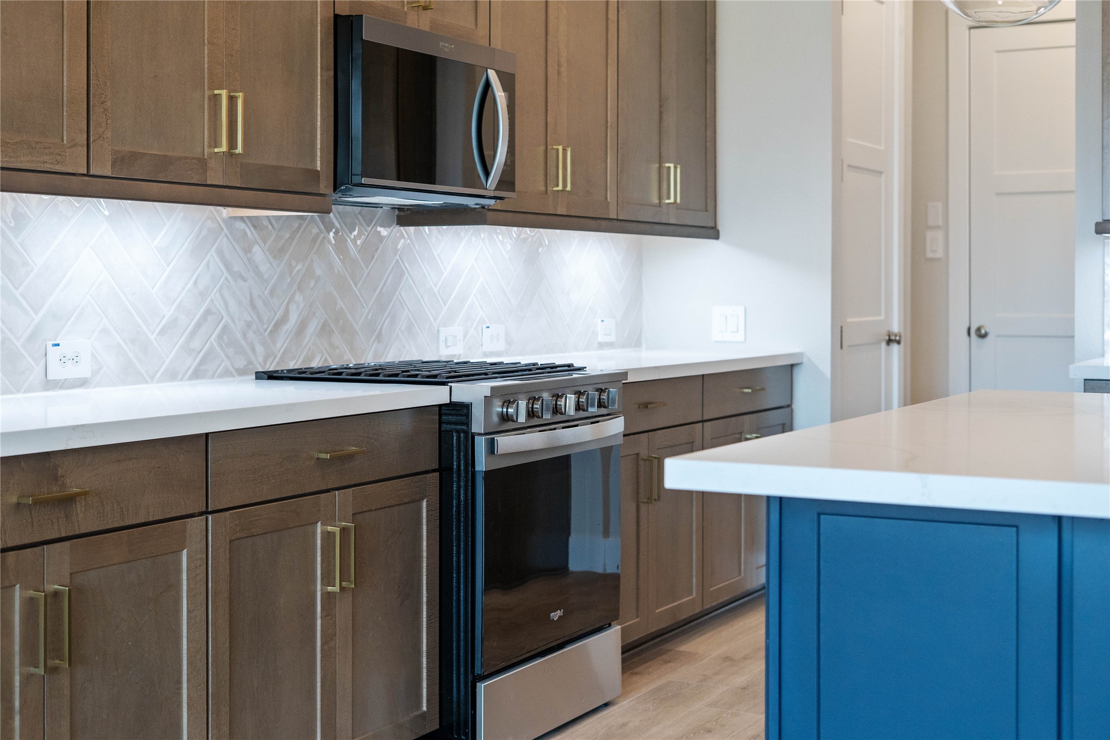 Whirlpool Stainless Steel appliances. Featured here are the gas range and microwave set.