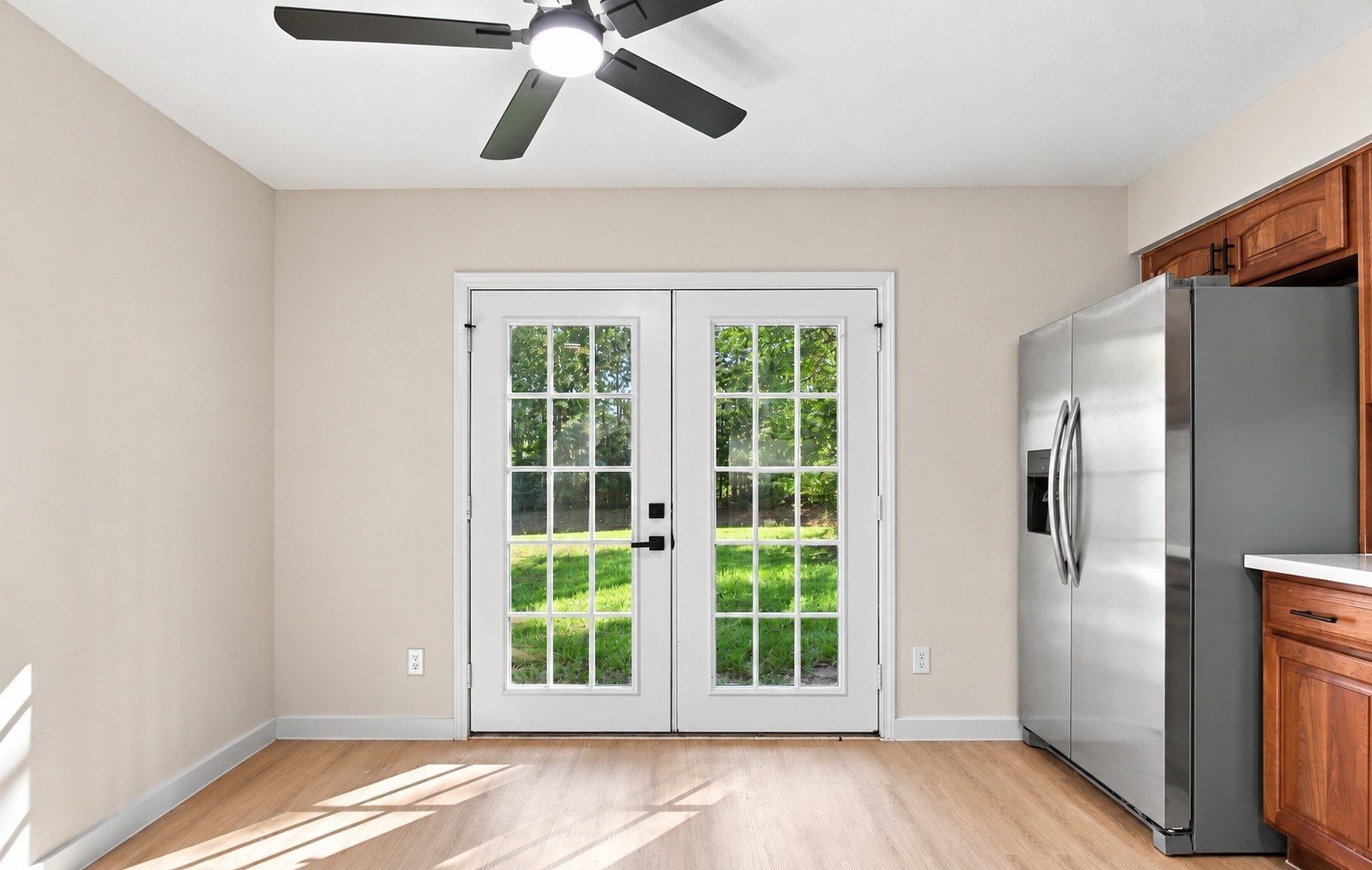 An angle of the dining room with a brand-new sliding door!