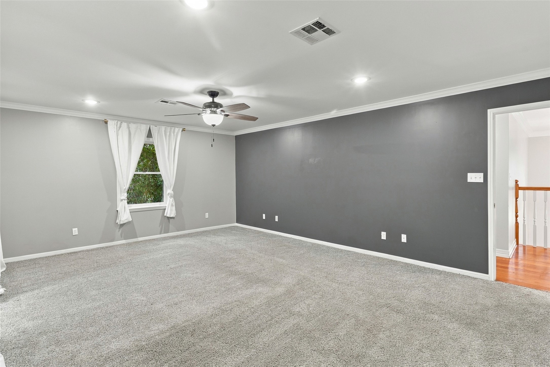 You will love this inviting, light-filled primary bedroom designed as a spacious retreat.