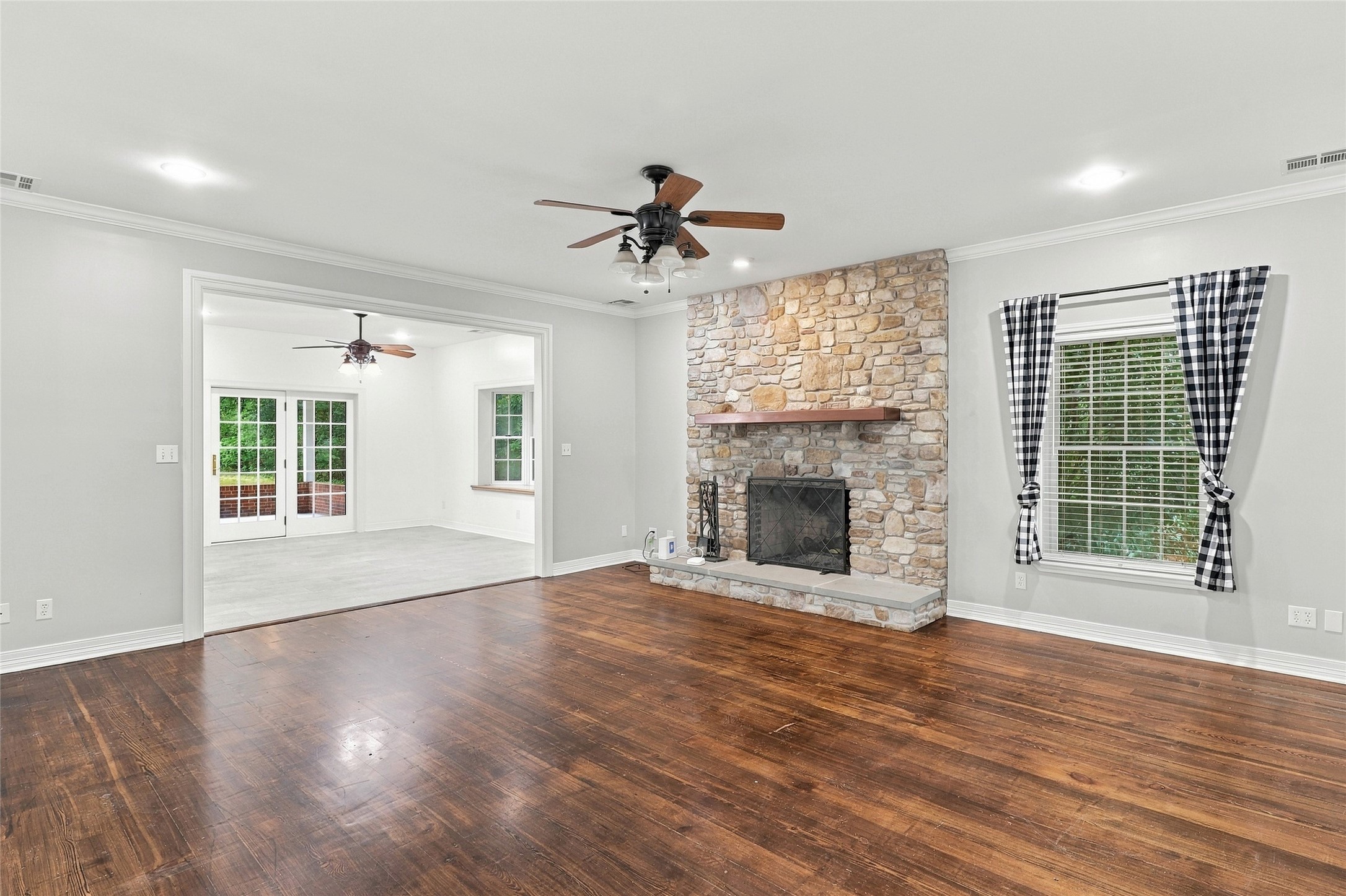 Cozy family room that transitions seamlessly into a comfortable breakfast nook with an airy, open layout.