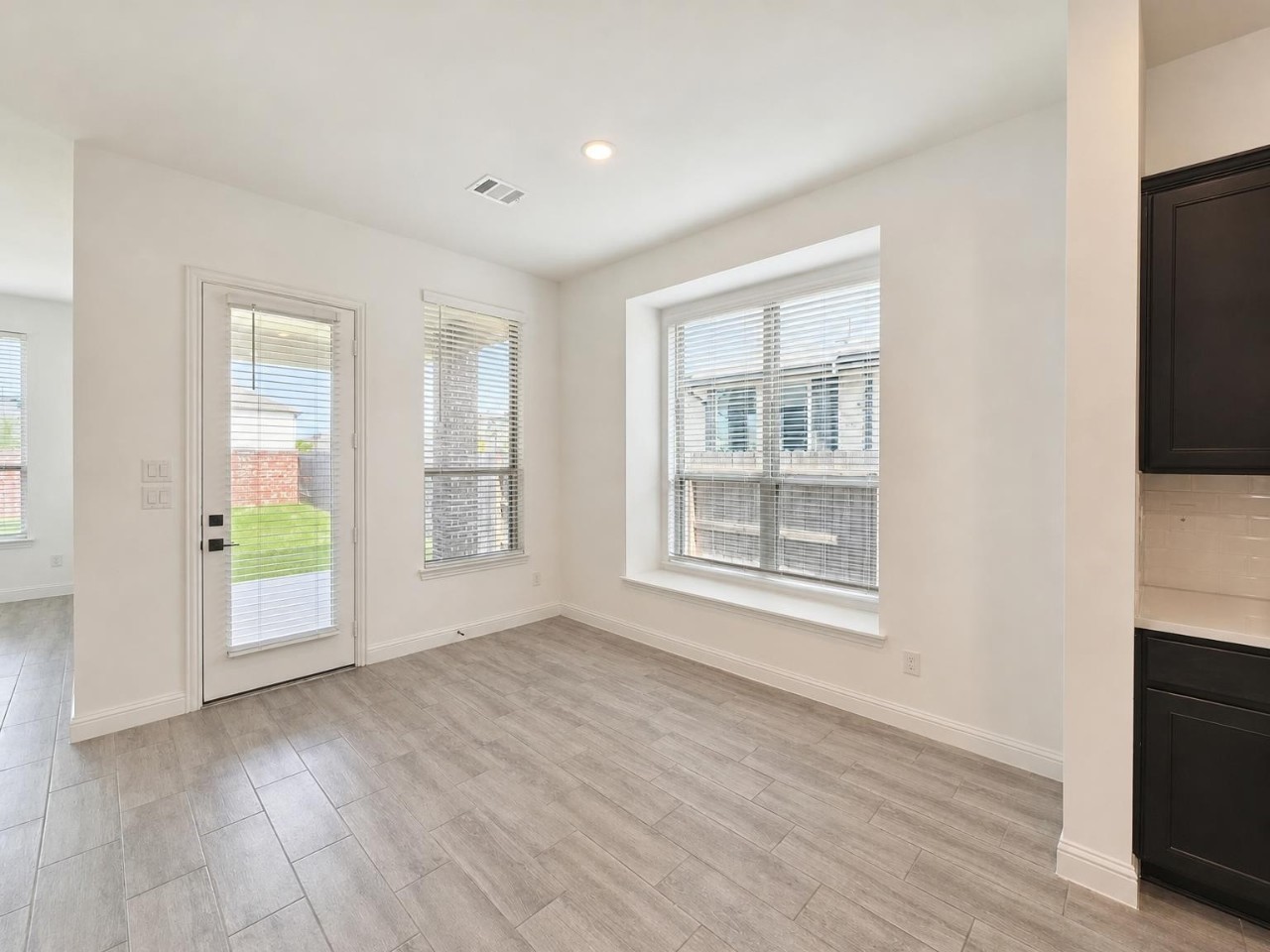 The upgraded boxed out window in the breakfast nook provides beautiful light!