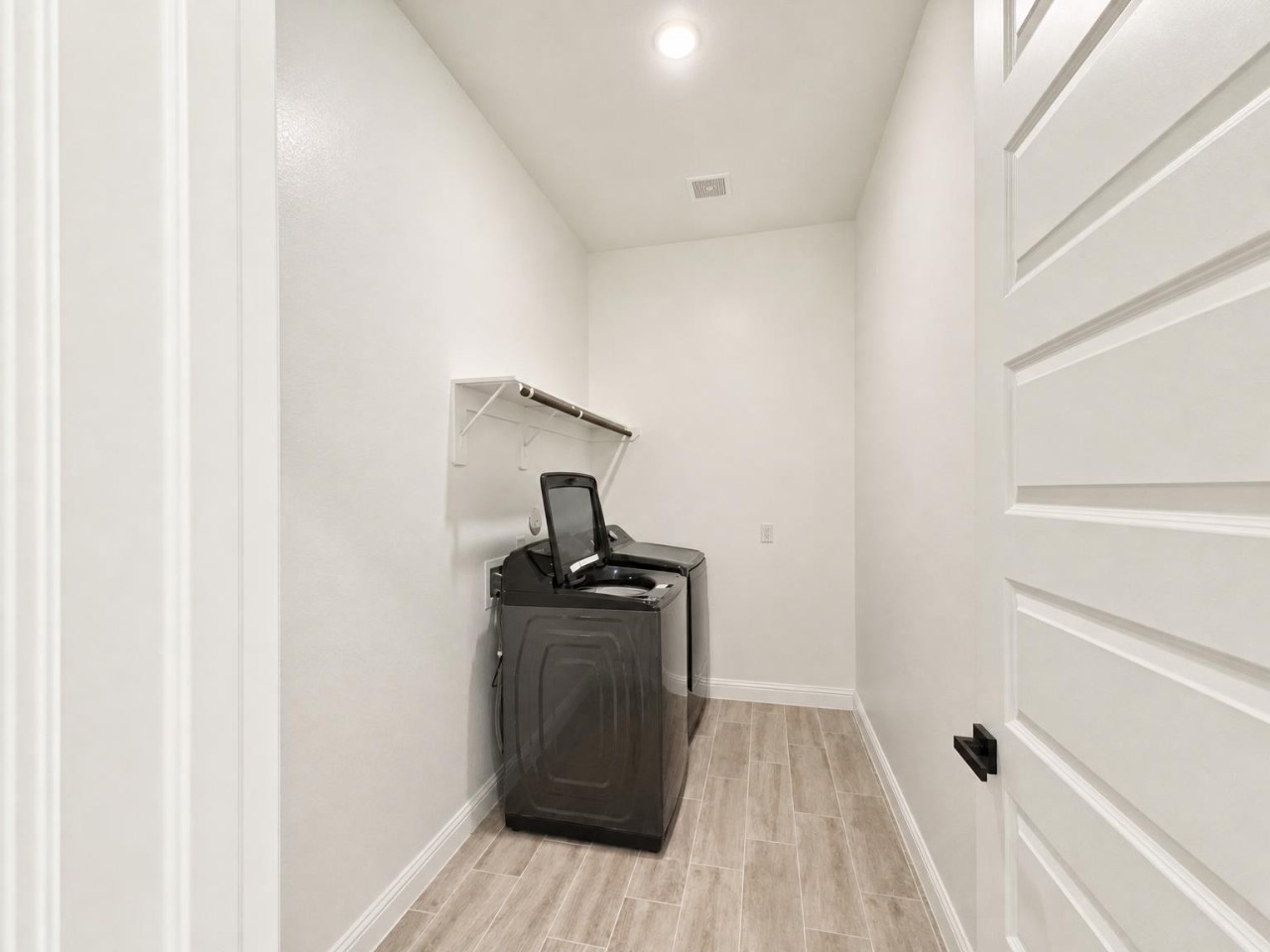 This home provides great storage with a large utility room, coat closet, and two additional closets upstairs.