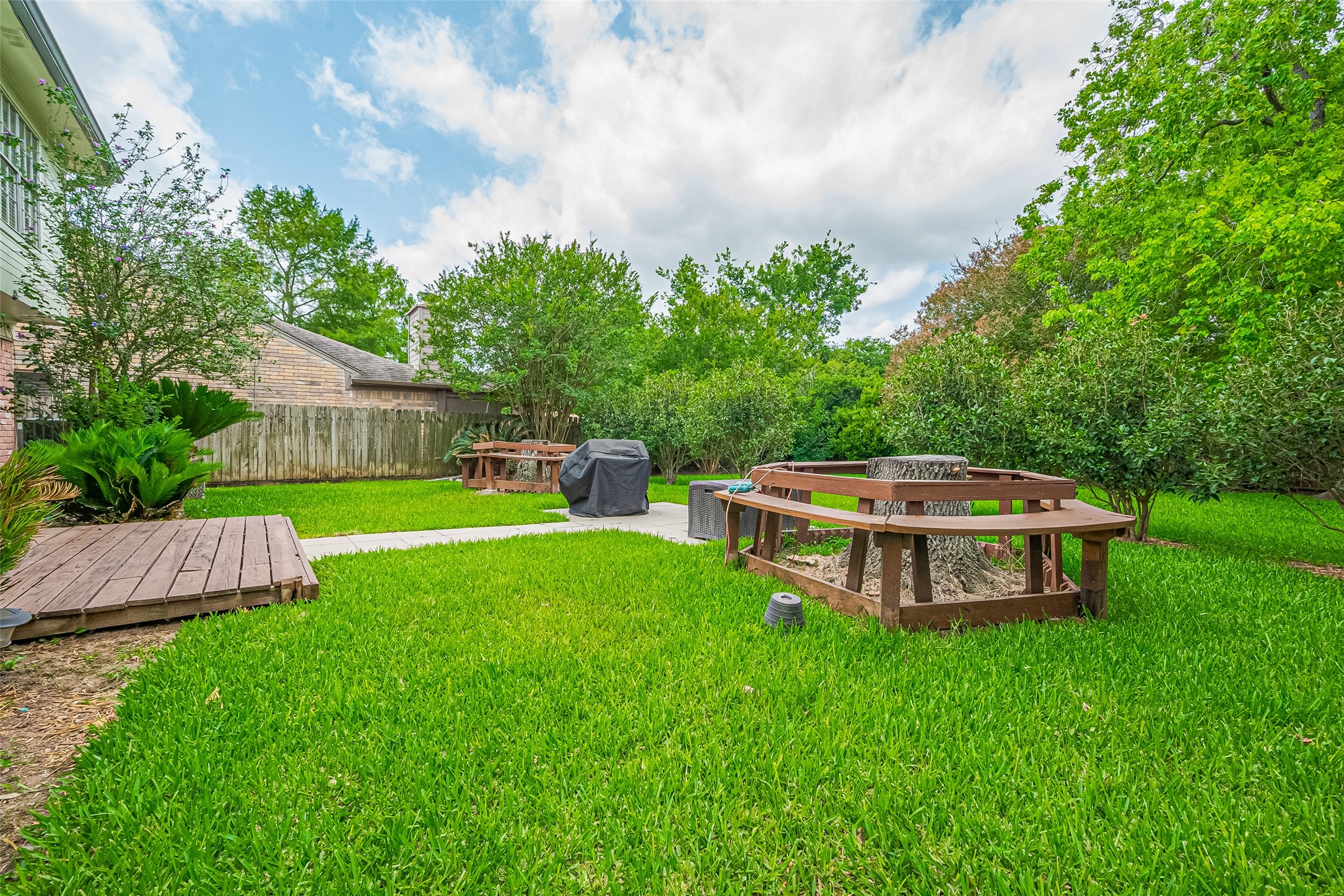 Spacious lush green backyard
