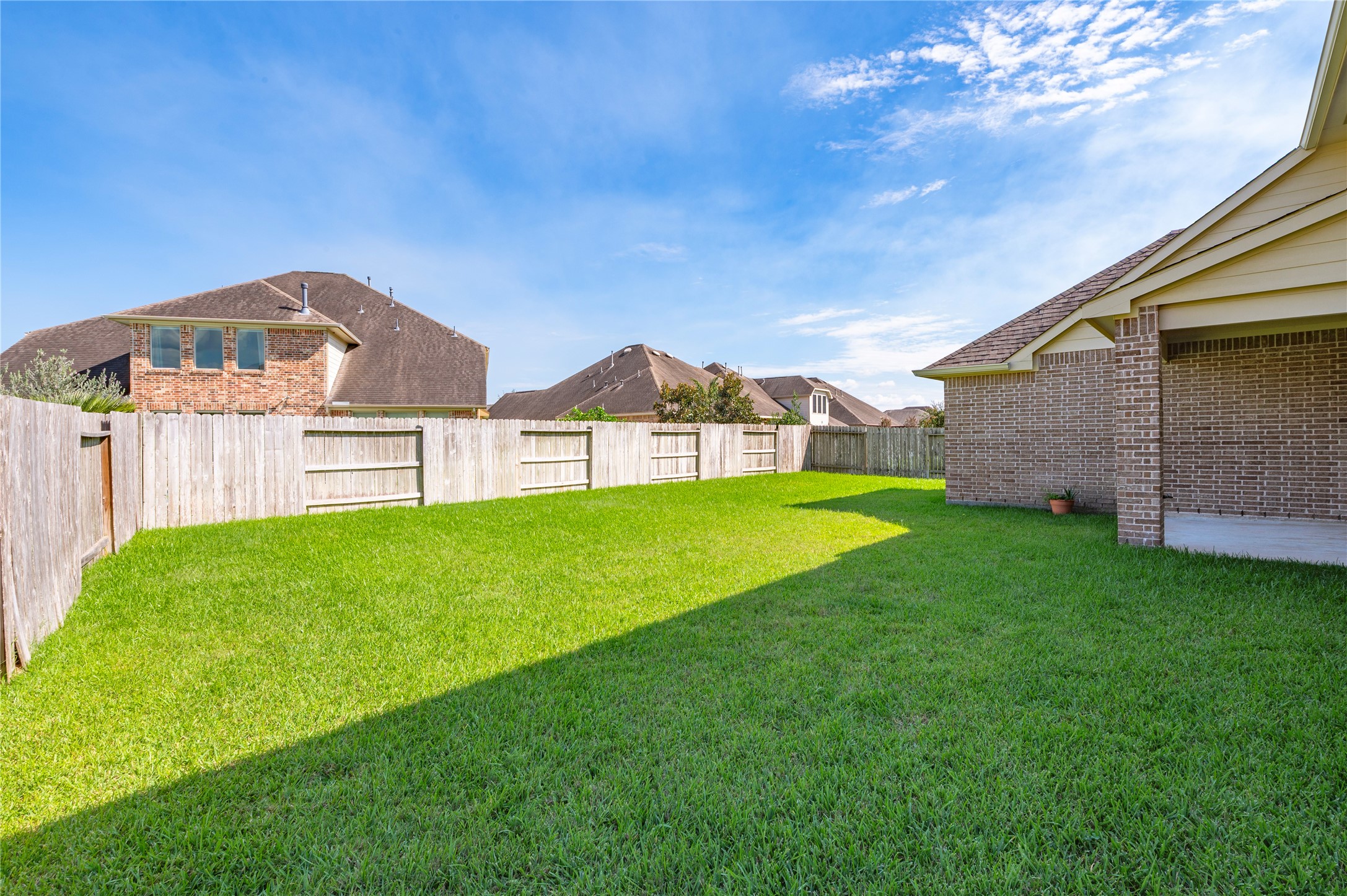 Pool sized backyard; home is fully bricked on all four sides.