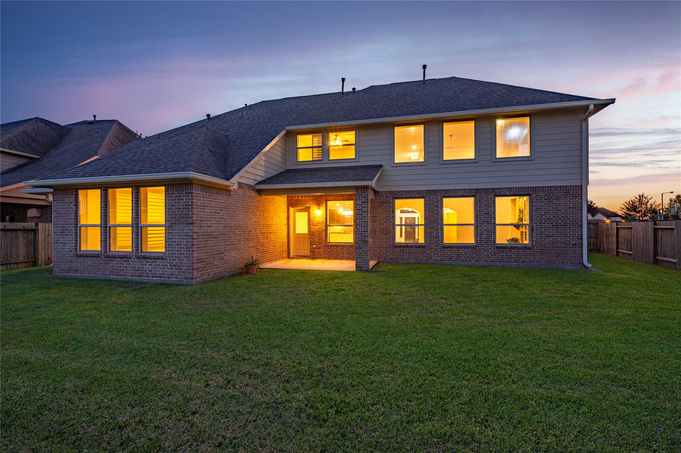 Pool-size back yard is fully fenced while the home features full brick on all four sides, gutters and covered back patio.