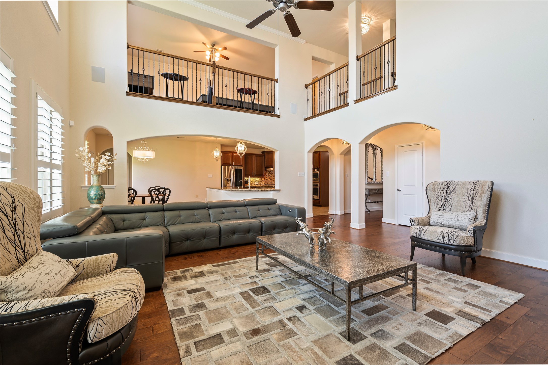 Surround sound speakers in the family room, and desirable open-concept family room flows seamlessly into the kitchen and breakfast areas.