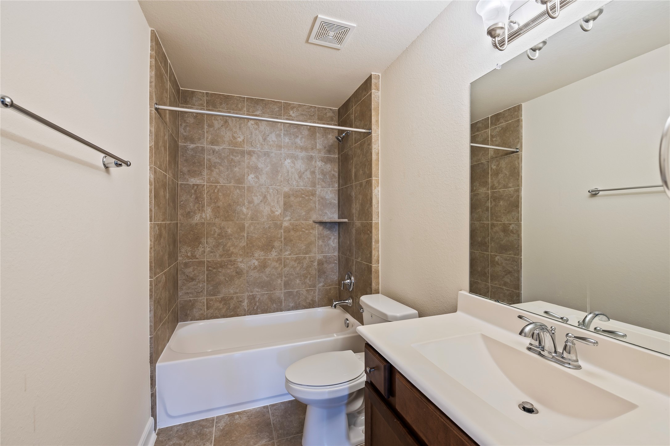 3rd full bathroom upstairs with tub/shower combo. Ceramic tile and grout recently professionally cleaned upon seller's move out.